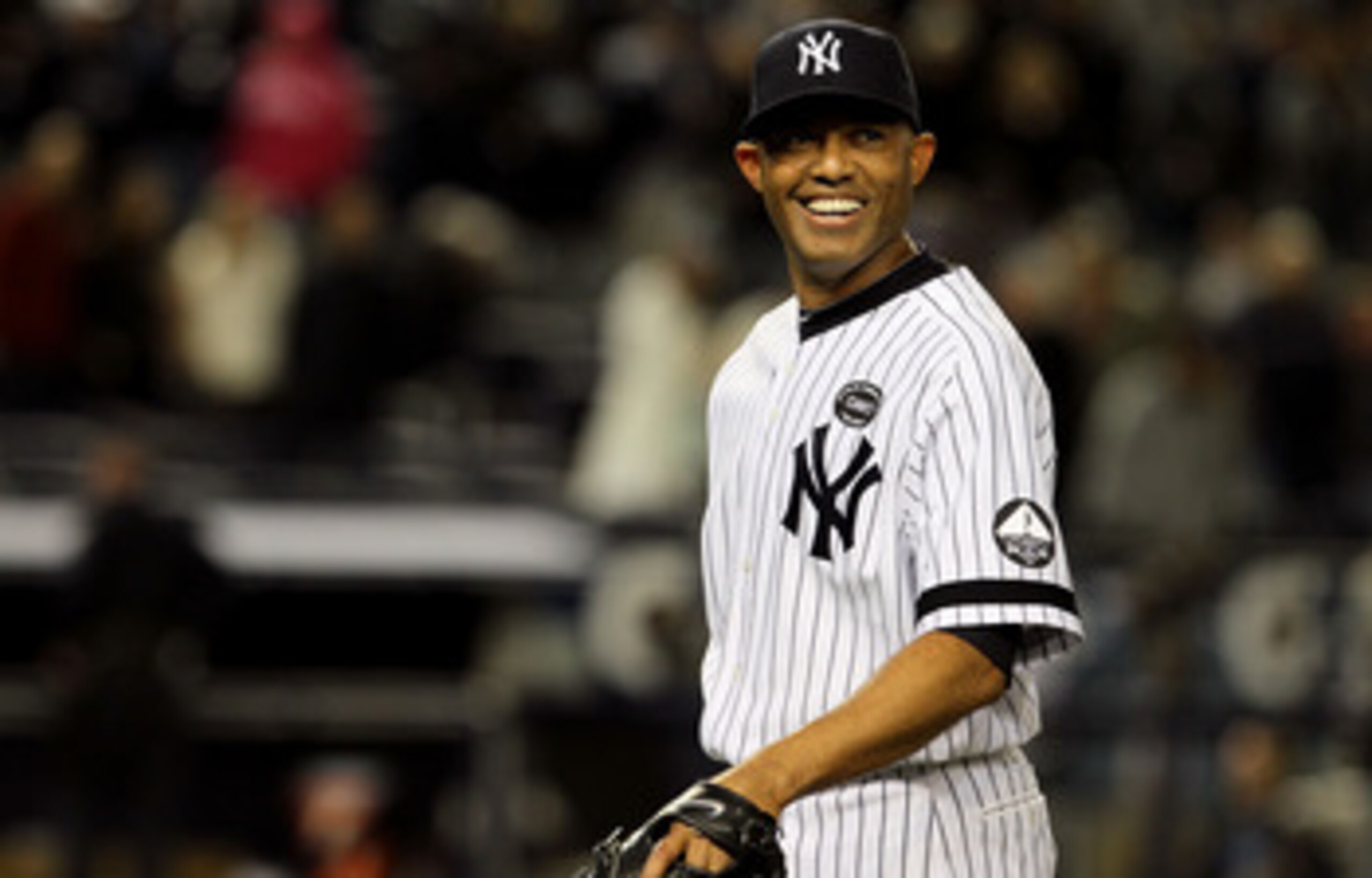 NEW YORK - OCTOBER 09:  Mariano Rivera #42 of the New York Yankees smiles after the Yankees won 6-1 against the Minnesota Twins during Game Three of the ALDS part of the 2010 MLB Playoffs at Yankee Stadium on October 9, 2010 in the Bronx borough of New Yo