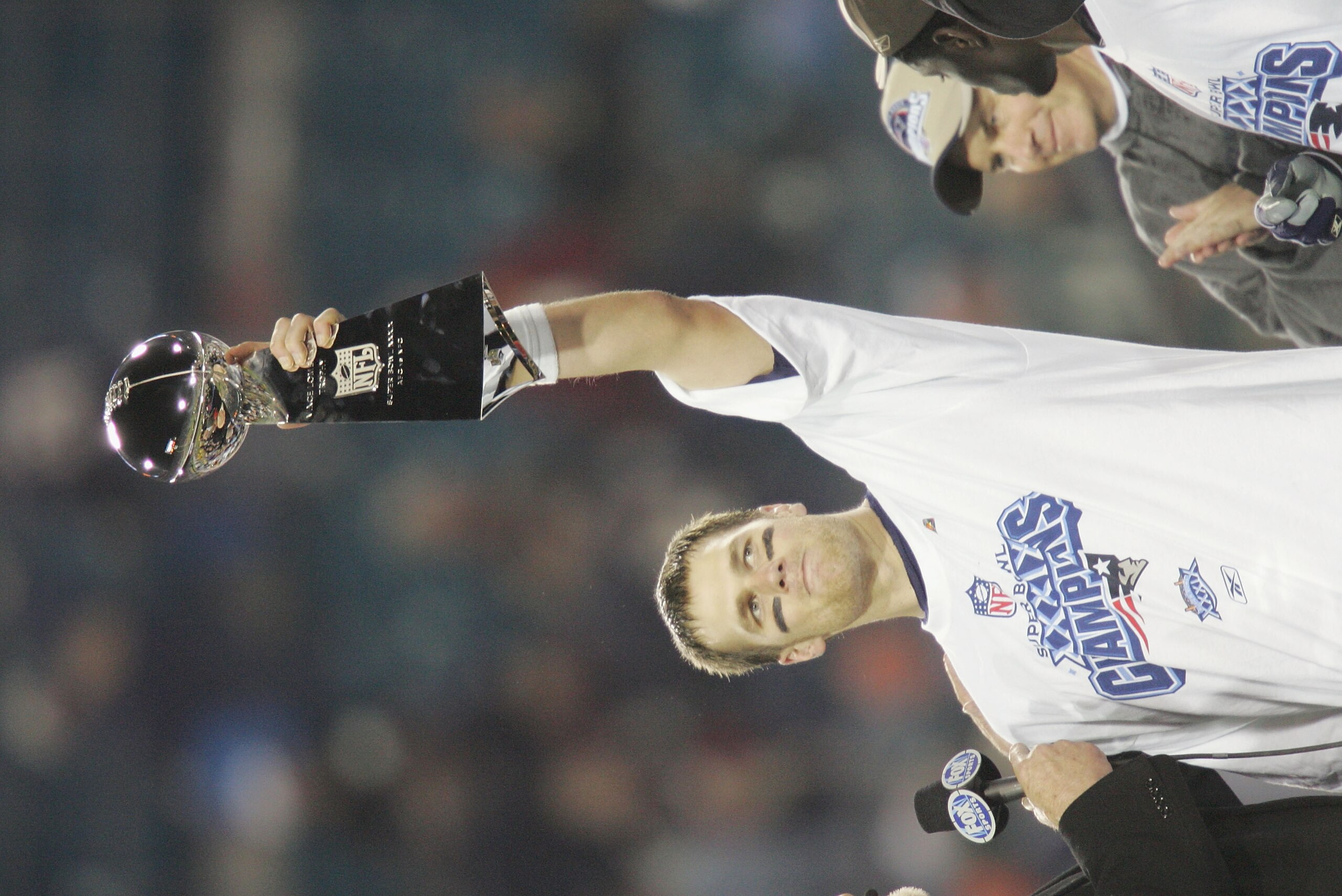 JACKSONVILLE, FL - FEBRUARY 6: Quarterback Tom Brady #12 of the New England Patriots holds up the Lombardi Trophy after defeating the Philadelphia Eagles in Super Bowl XXXIX at Alltel Stadium on February 6, 2005 in Jacksonville, Florida. The Patriots def JACKSONVILLE, FL - FEBRUARY 6: Quarterback Tom Brady #12 of the New England Patriots holds up the Lombardi Trophy after defeating the Philadelphia Eagles in Super Bowl XXXIX at Alltel Stadium on February 6, 2005 in Jacksonville, Florida. The Patriots def