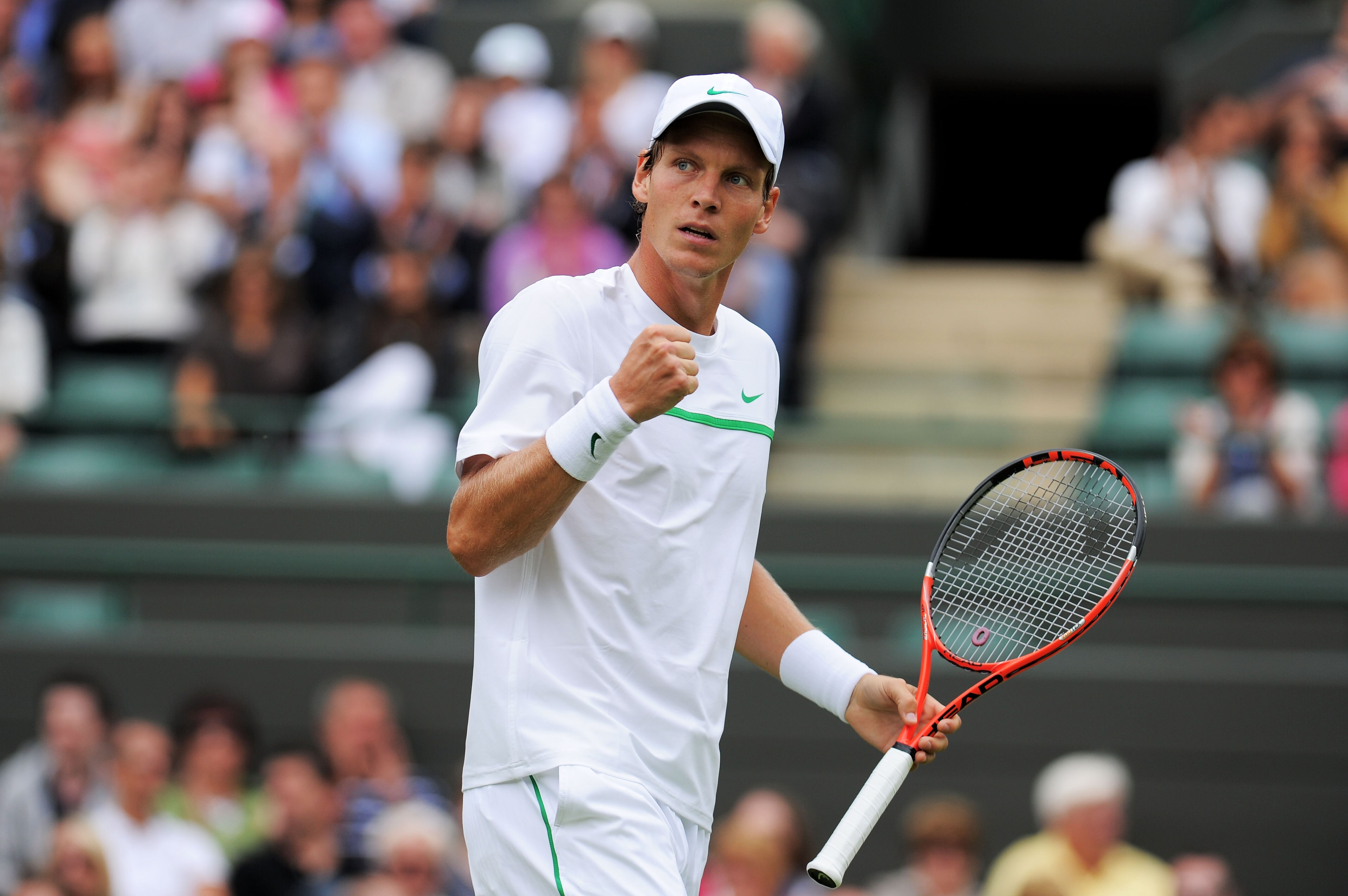 LONDON, ENGLAND - JUNE 20:  Tomas Berdych of the Czech Republic reacts to a play during his first round match against Filippo Volandri of Italy on Day One of the Wimbledon Lawn Tennis Championships at the All England Lawn Tennis and Croquet Club on June 2