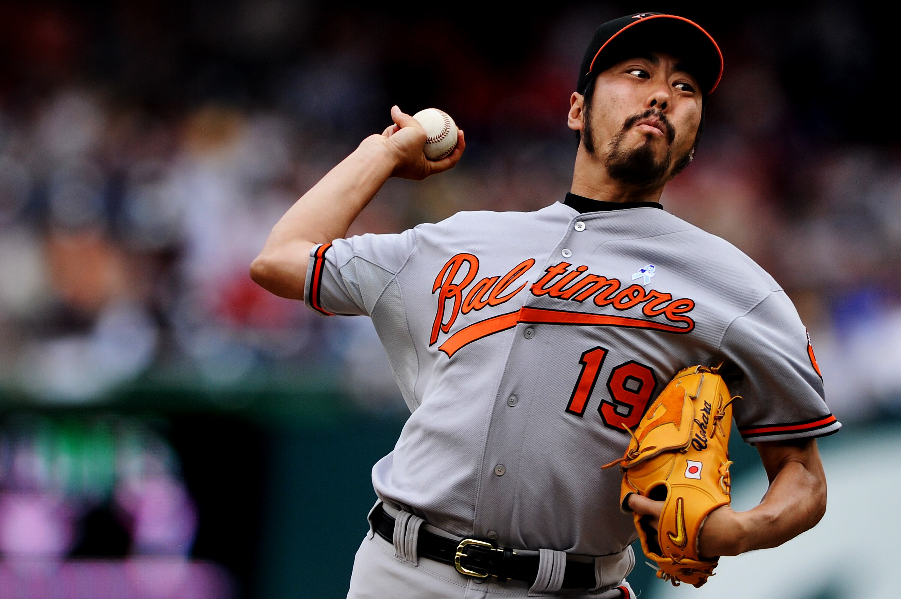 WASHINGTON, DC - JUNE 19: Pitcher Koji Uehara #19 of the Baltimore Orioles works the ninth inning against the Washington Nationals at Nationals Park on June 19, 2011 in Washington, DC. The Baltimore Orioles won, 7-4. (Photo by Patrick Smith/Getty Images)