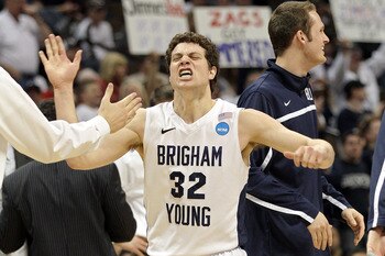 DENVER, CO - MARCH 19:  Jimmer Fredette #32 of the Brigham Young Cougars celebrates after a play against the Gonzaga Bulldogs during the third round of the 2011 NCAA men's basketball tournament at Pepsi Center on March 19, 2011 in Denver, Colorado.  (Phot