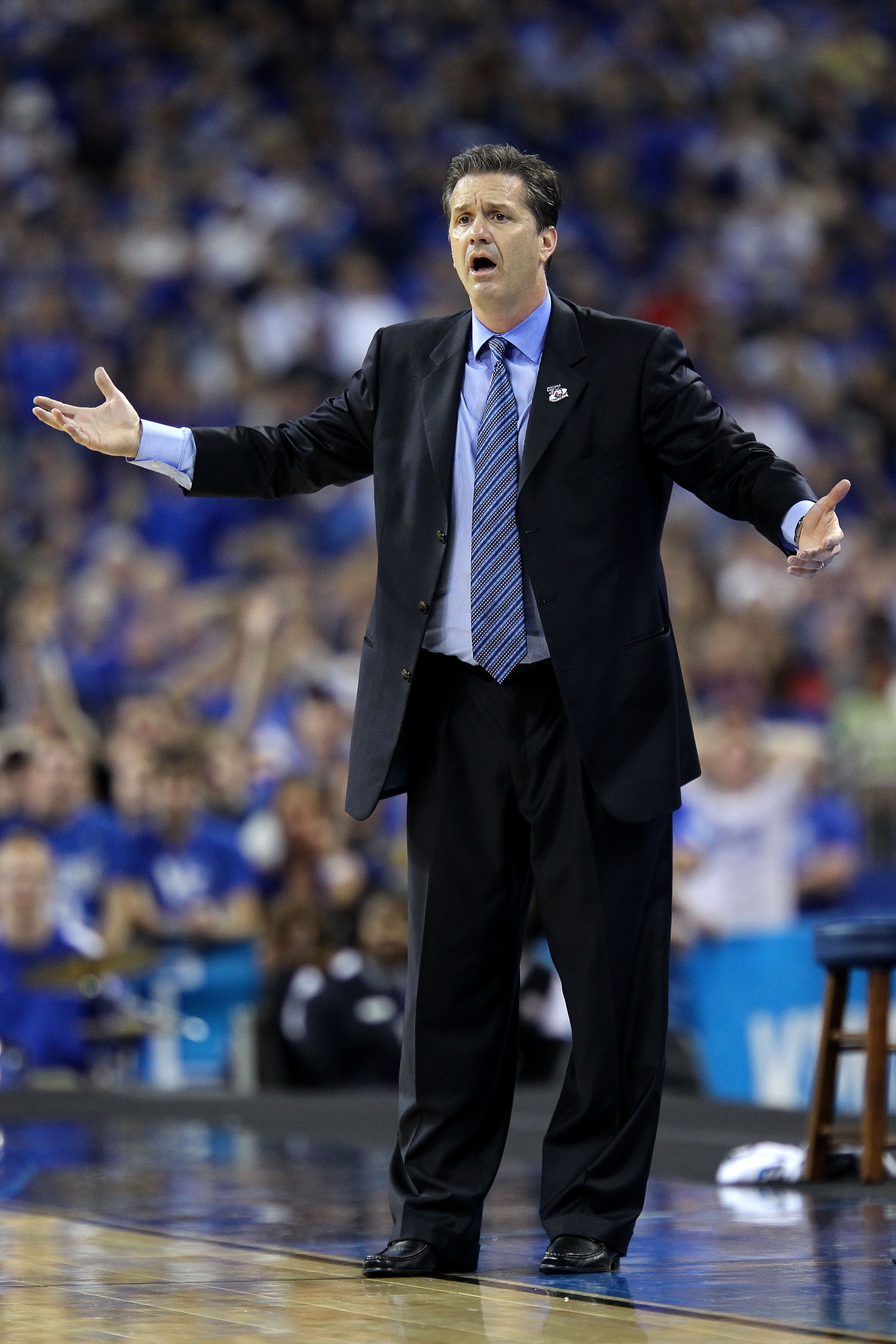 HOUSTON, TX - APRIL 02:  Head coach John Calipari of the Kentucky Wildcats reacts from the sidelines against the Connecticut Huskies during the National Semifinal game of the 2011 NCAA Division I Men's Basketball Championship at Reliant Stadium on April 2