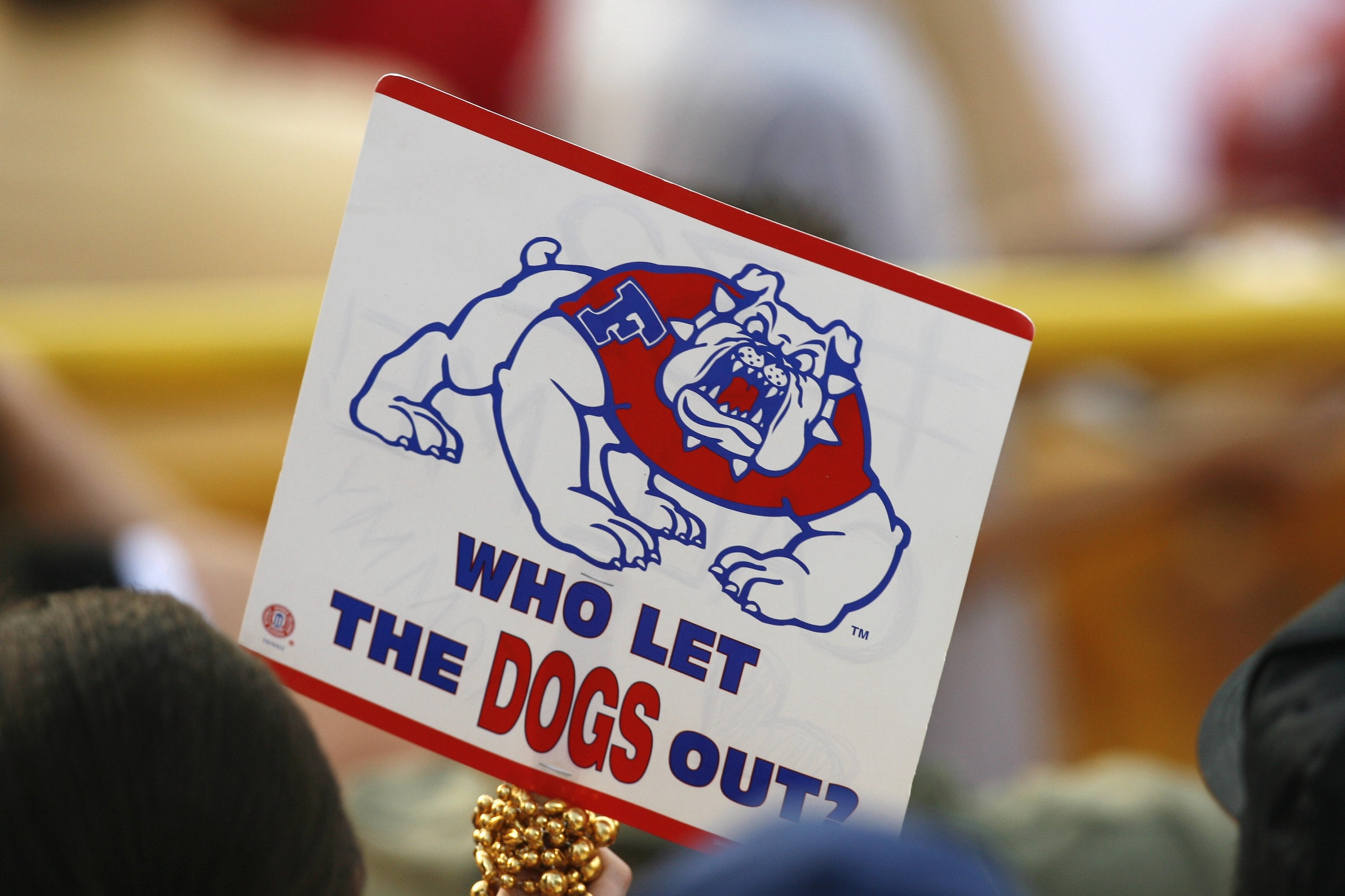 OMAHA, NE - JUNE 23:  A fan holds up a sign for the Fresno State Bulldogs during Game 1 of the 2008 Men's College World Series Championship of the Georgia Bulldogs on June 23, 2008 at Rosenblatt Stadium in Omaha, Nebraska.  (Photo by Kevin C. Cox/Getty Im