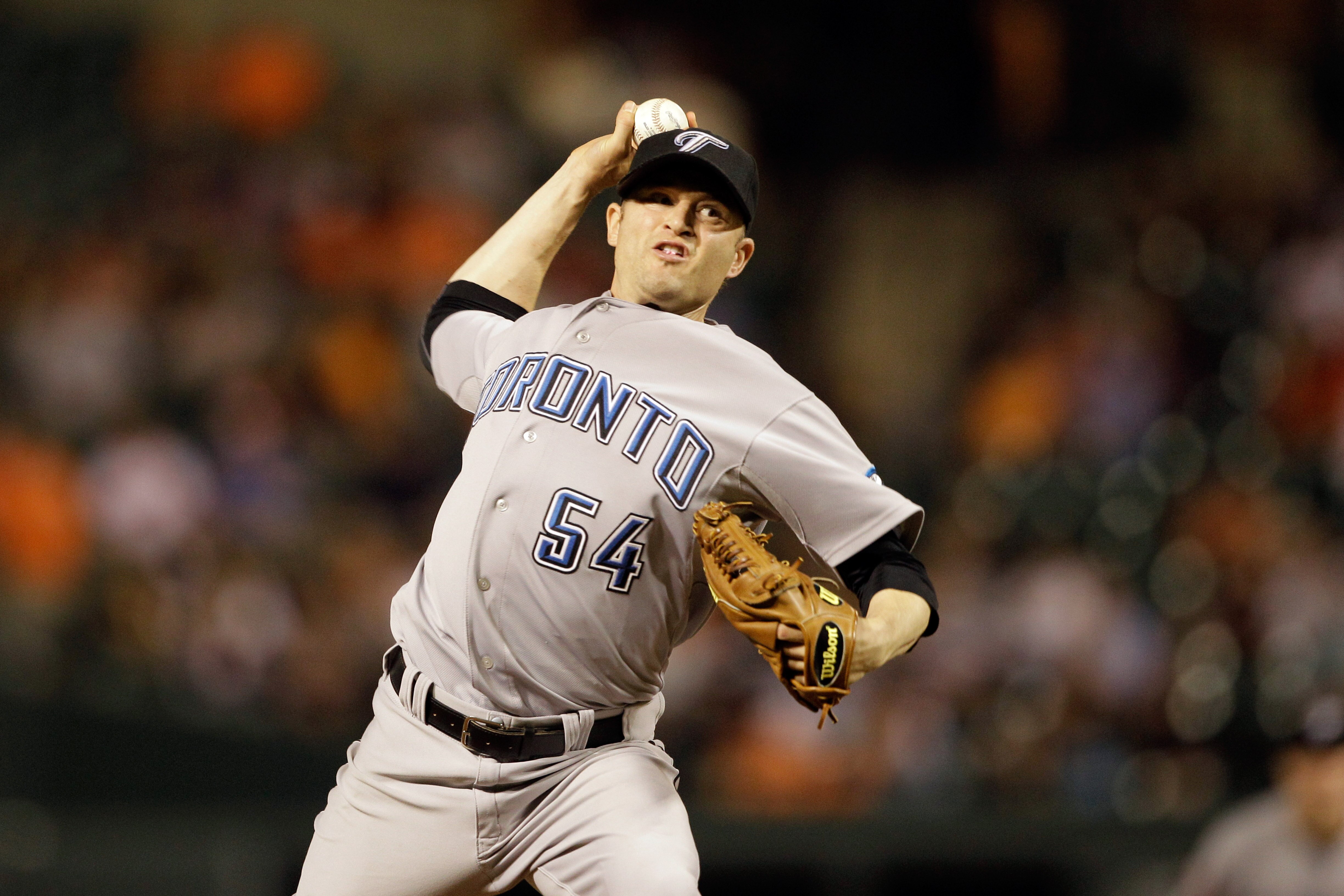 BALTIMORE, MD - JUNE 03: Jason Frasor #54 of the Toronto Blue Jays in action against the Baltimore Orioles at Oriole Park at Camden Yards on June 3, 2011 in Baltimore, Maryland.  The Blue Jays won 8-4. (Photo by Rob Carr/Getty Images)