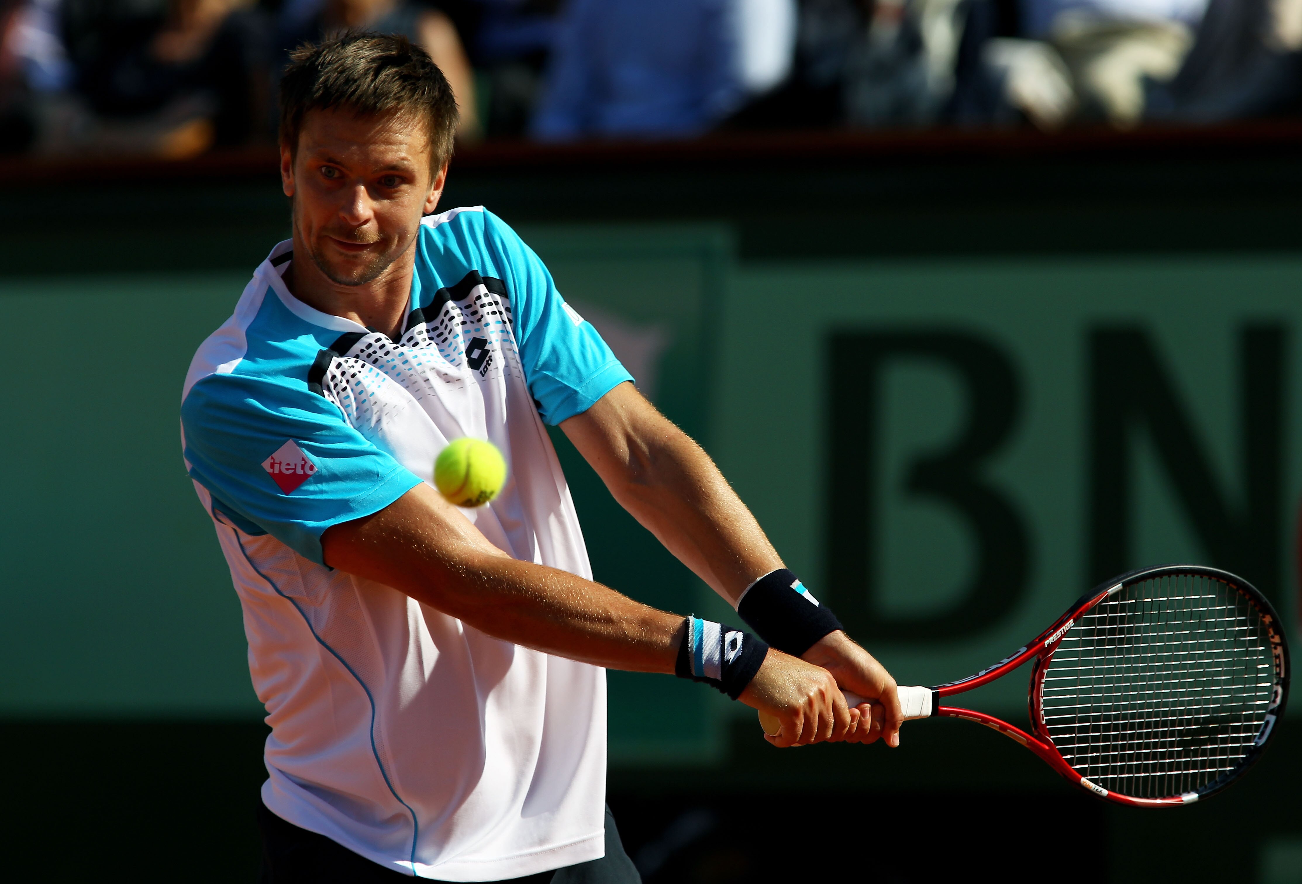 PARIS, FRANCE - JUNE 01:  Robin Soderling of Sweden hits a backhand during the men's singles quarterfinal match between Rafael Nadal of Spain and Robin Soderling of Sweden on day eleven of the French Open at Roland Garros on June 1, 2011 in Paris, France.