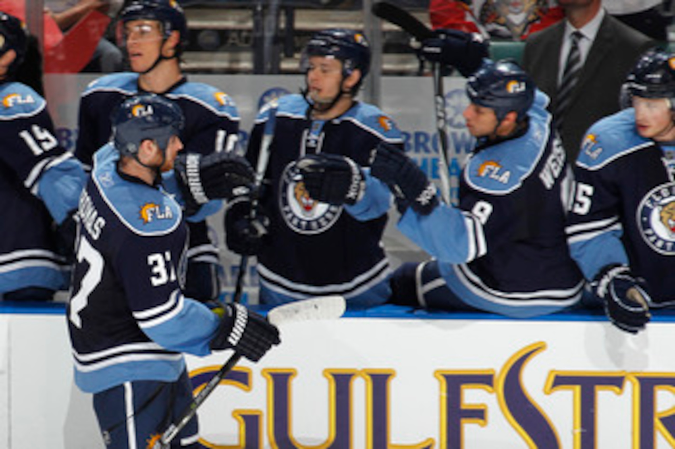SUNRISE, FL - APRIL 9: Bill Thomas #37 of the Florida Panthers is congratulated after scoring the game winning goal against the Washington Capitals on April 9, 2011 at the BankAtlantic Center in Sunrise, Florida. The Panthers defeated the Capitals 1-0. (P