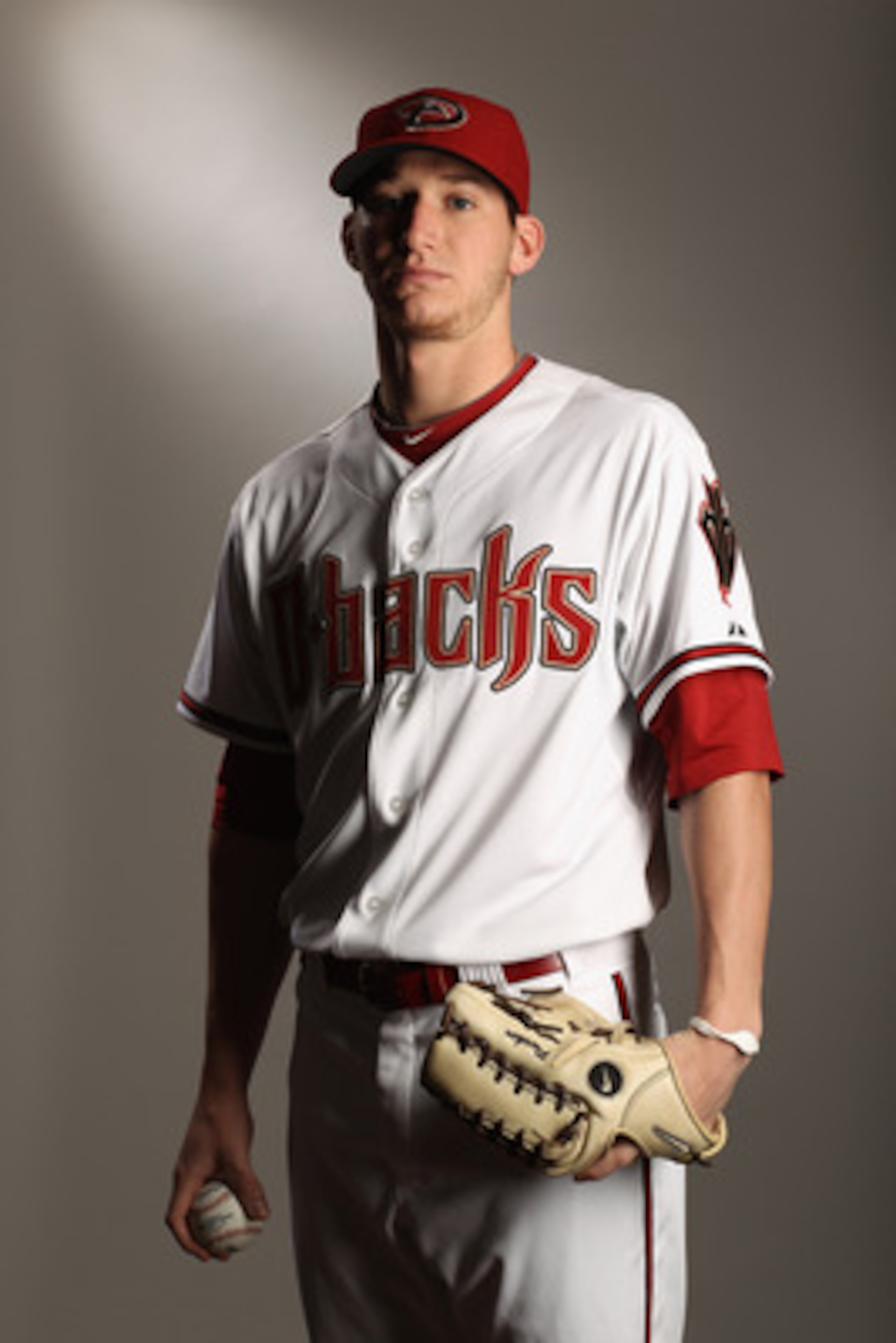 SCOTTSDALE, AZ - FEBRUARY 21: Jarrod Parker #61 of the Arizona Diamondbacks poses for a portrait at Salt River Fields at Talking Stick on February 21, 2011 in Scottsdale, Arizona. (Photo by Ezra Shaw/Getty Images) SCOTTSDALE, AZ - FEBRUARY 21: Jarrod Parker #61 of the Arizona Diamondbacks poses for a portrait at Salt River Fields at Talking Stick on February 21, 2011 in Scottsdale, Arizona. (Photo by Ezra Shaw/Getty Images)