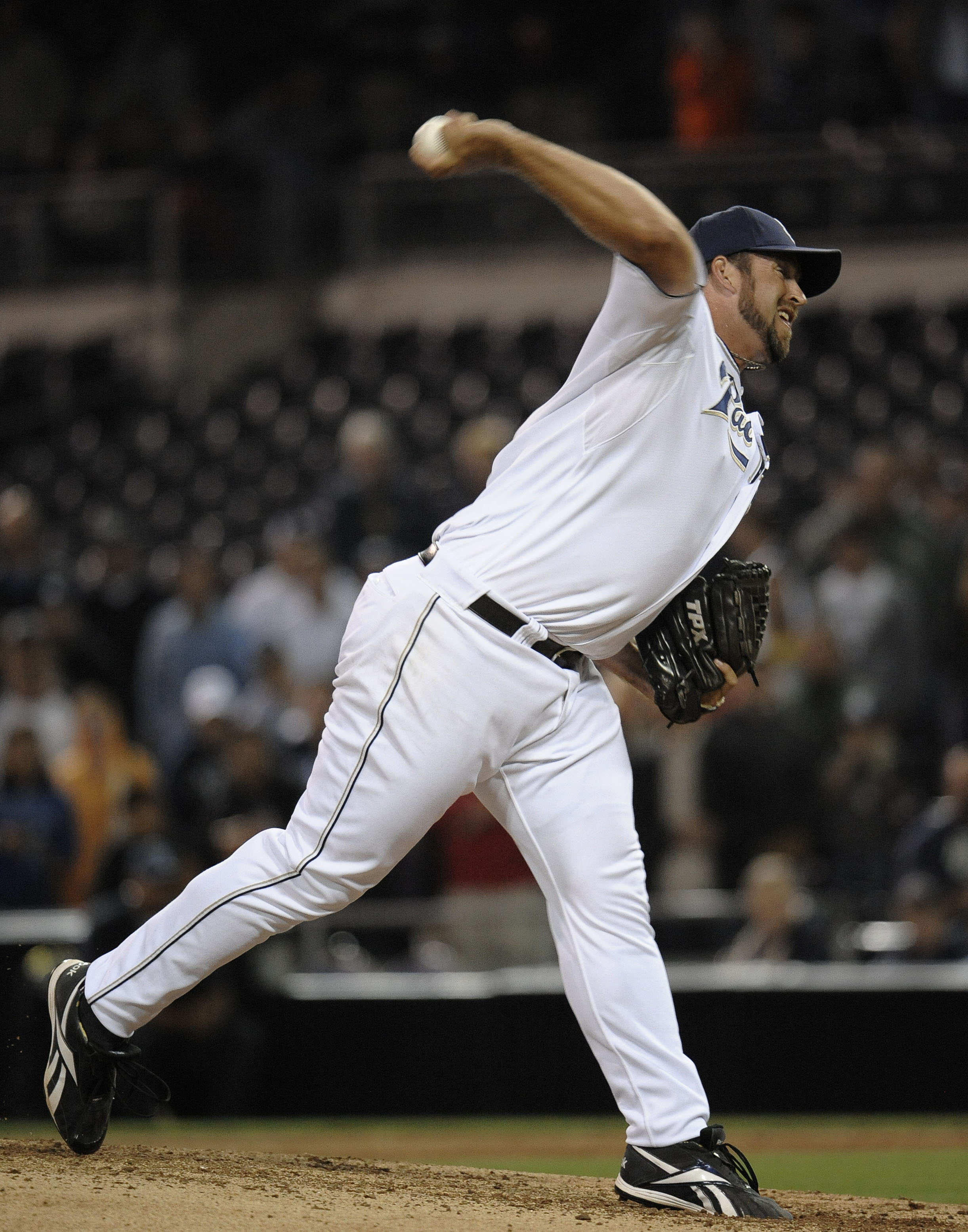 SAN DIEGO, CA - JUNE 7: Heath Bell #21 of the San Diego Padres pitches during the ninth inning of a baseball game against the Colorado Rockies at Petco Park on June 7, 2011 in San Diego, California.  (Photo by Denis Poroy/Getty Images)