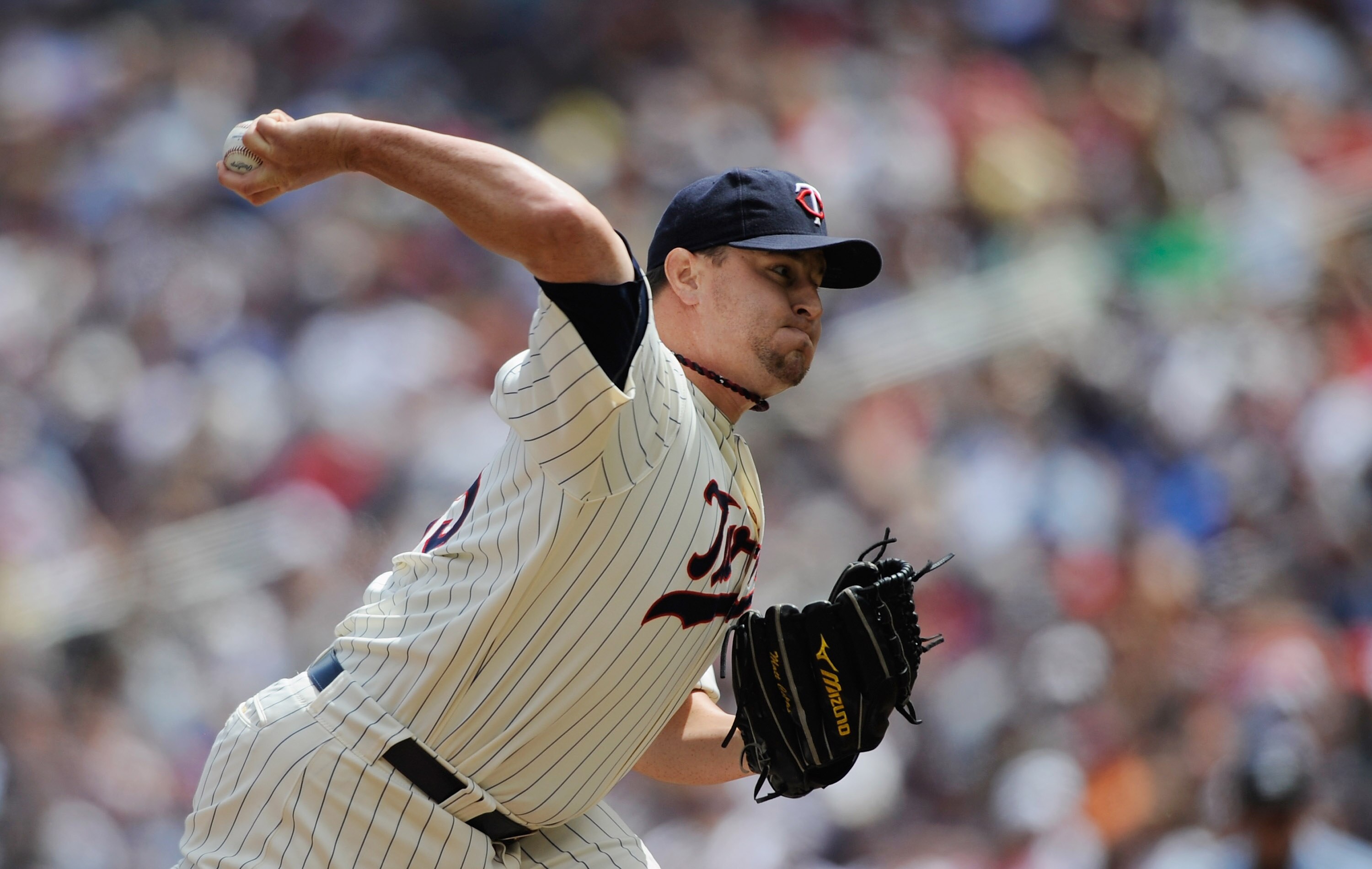 MINNEAPOLIS, MN - JUNE 16: Matt Capps #55 of the Minnesota Twins delivers a pitch against the Chicago White Sox in the ninth inning on June 16, 2011 at Target Field in Minneapolis, Minnesota. The Twins defeated the White Sox 1-0. (Photo by Hannah Foslien/