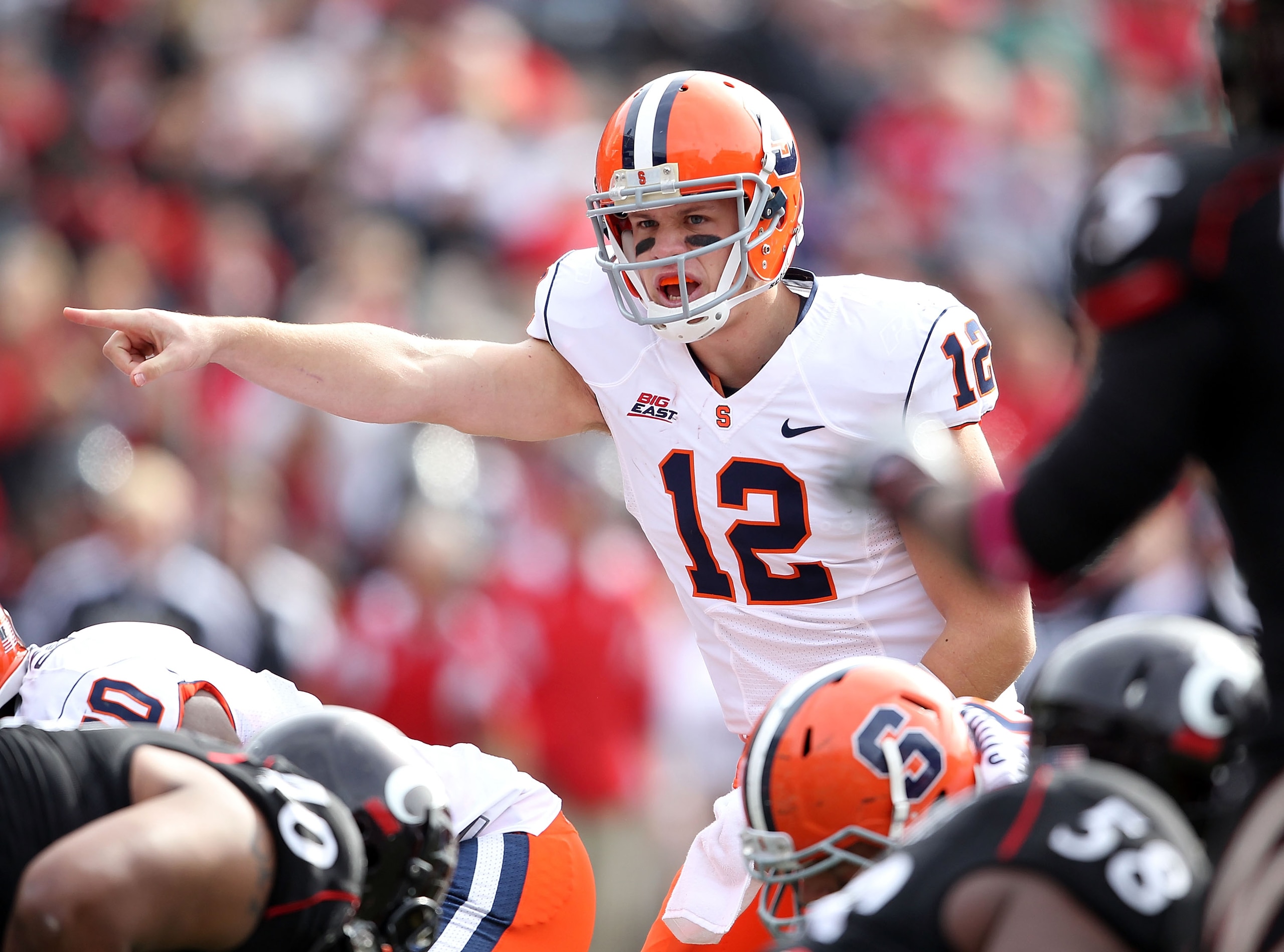 CINCINNATI - OCTOBER 30:  Ryan Nassib #12 of the Syracuse Orange gives instructions to his team during the Big East Conference game against the Cincinnati Bearcats at Nippert Stadium on October 30, 2010 in Cincinnati, Ohio.  (Photo by Andy Lyons/Getty Ima
