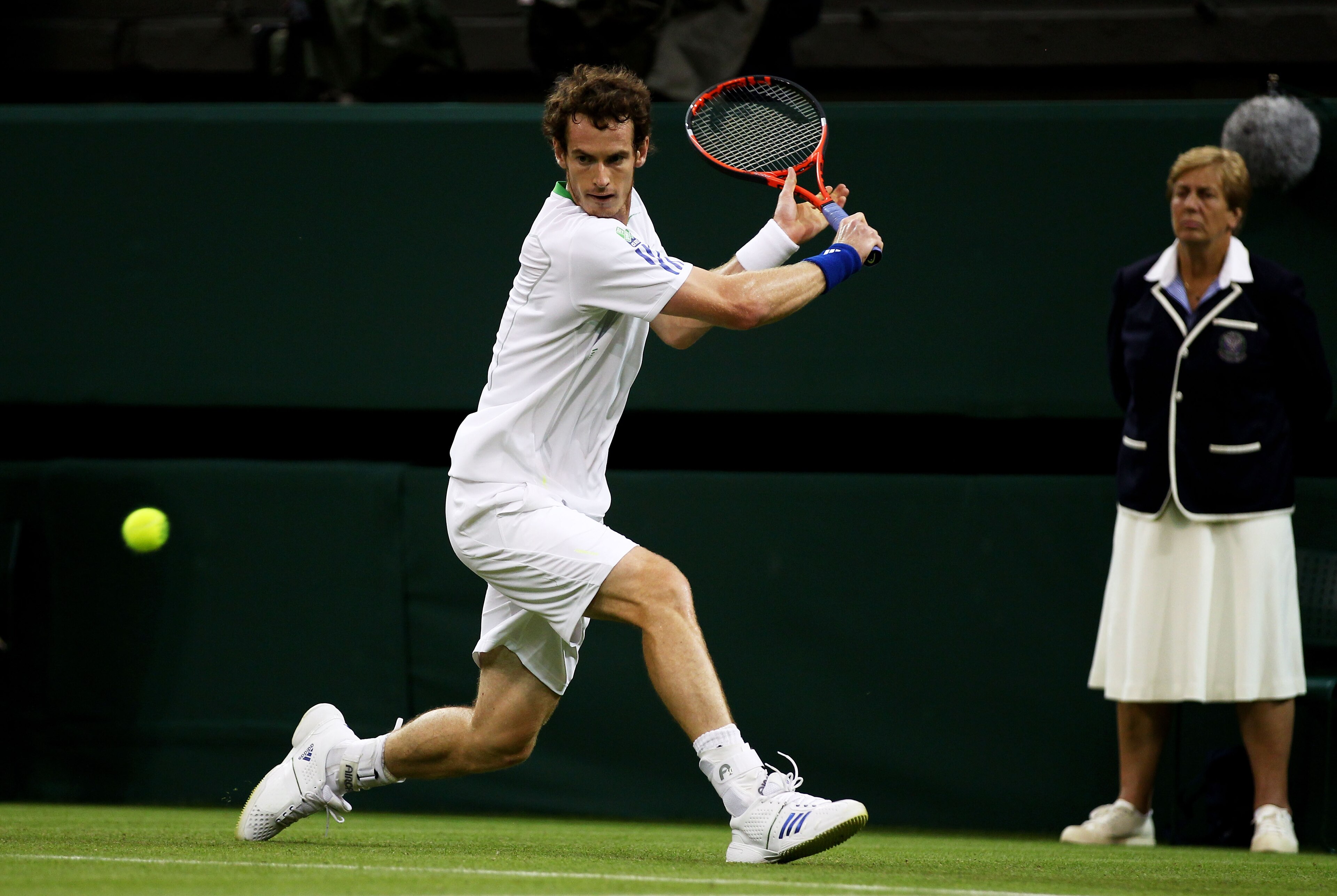 LONDON, ENGLAND - JUNE 20: Andy Murray of Great Britain hits a backhand during his first round match against Daniel Gimeno-Traver of Spain on Day One of the Wimbledon Lawn Tennis Championships at the All England Lawn Tennis and Croquet Club on June 20, 2 LONDON, ENGLAND - JUNE 20: Andy Murray of Great Britain hits a backhand during his first round match against Daniel Gimeno-Traver of Spain on Day One of the Wimbledon Lawn Tennis Championships at the All England Lawn Tennis and Croquet Club on June 20, 2