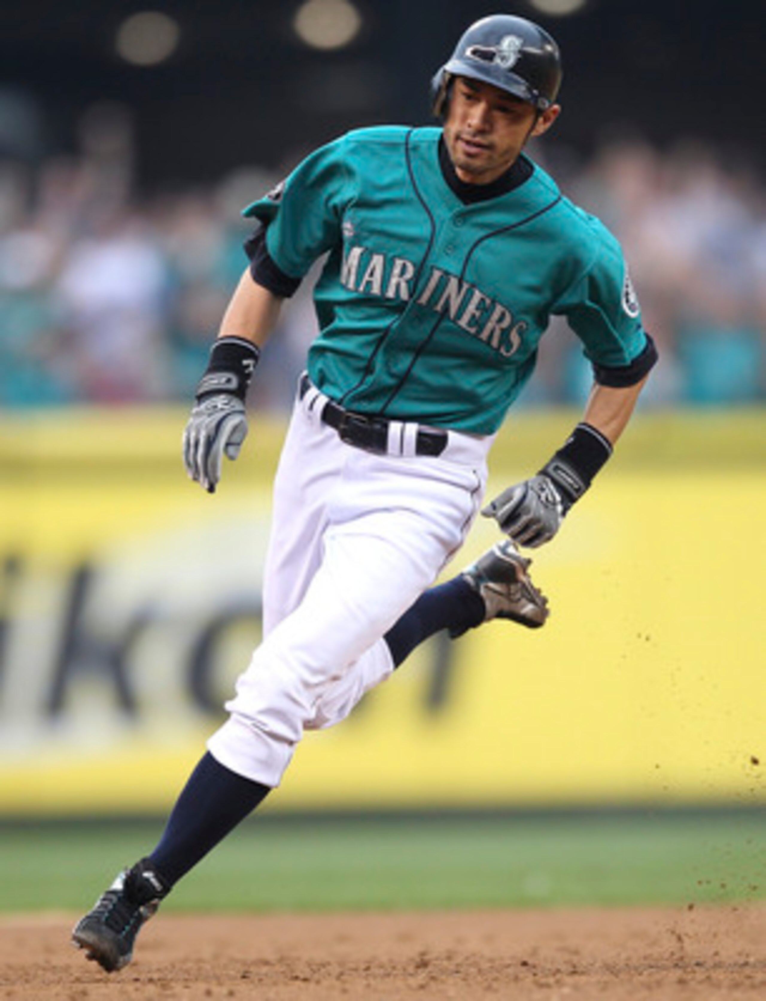 SEATTLE - JUNE 17:  Ichiro Suzuki #51 of the Seattle Mariners rounds third base to score in the third inning against the Philadelphia Phillies at Safeco Field on June 17, 2011 in Seattle, Washington. The Mariners defeated the Phillies 4-2. (Photo by Otto