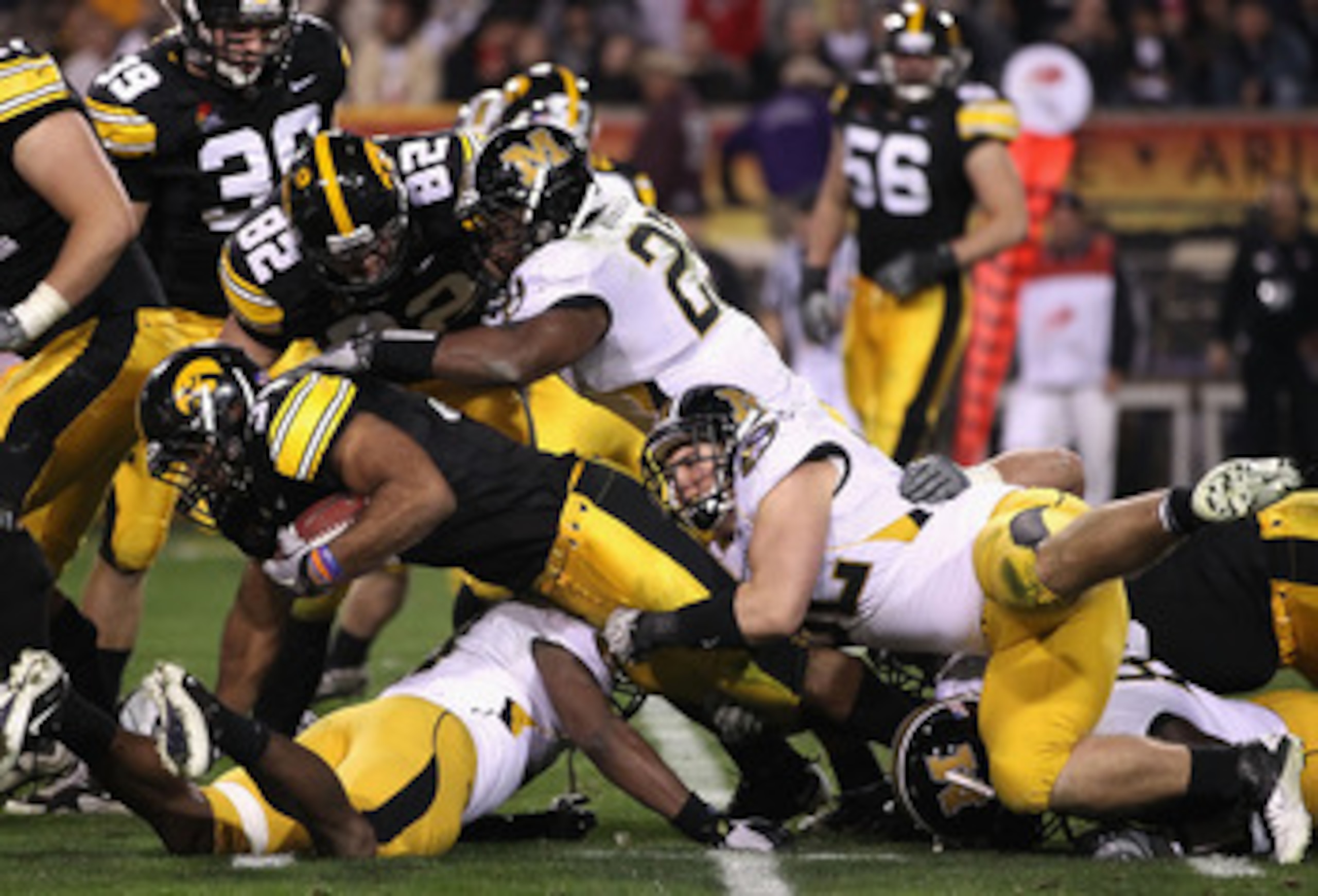 TEMPE, AZ - DECEMBER 28:  Runningback Marcus Coker #34 of the Missouri Tigers runs with the football against the Iowa Hawkeyes during the Insight Bowl at Sun Devil Stadium on December 28, 2010 in Tempe, Arizona.  (Photo by Christian Petersen/Getty Images)