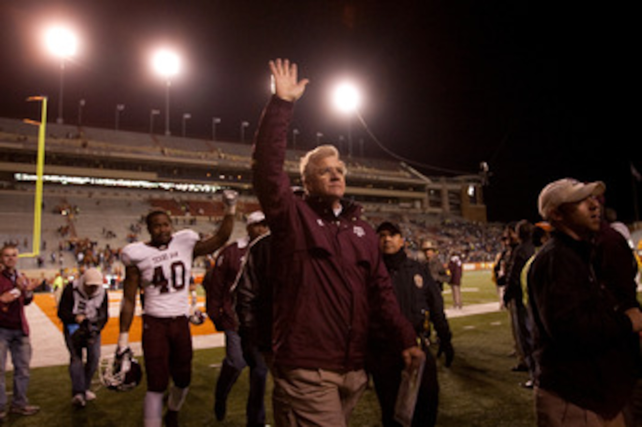 AUSTIN, TX - NOVEMBER 25:  Mike Sherman, head coach of Texas A&M, waves to fans following Texas A&M's 24-17 win over the University of Texas at Darrell K. Royal-Texas Memorial Stadium on November 25, 2010 in Austin, Texas. (Photo by Darren Carroll/Getty I