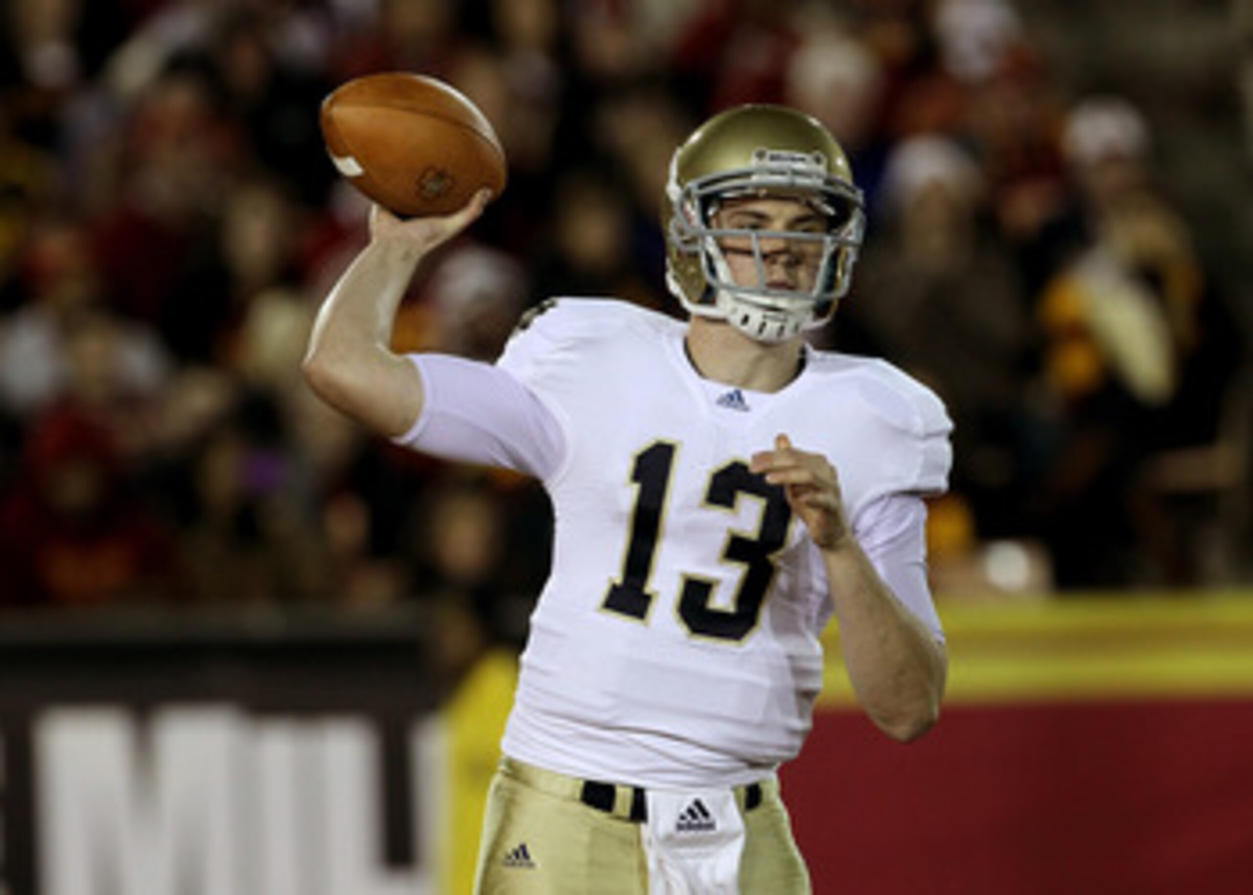 LOS ANGELES - NOVEMBER 27:  Quarterback Tommy Rees #13 of the Notre Dame Fighting Irish throws a pass against the USC Trojans at the Los Angeles Memorial Coliseum on November 27, 2010 in Los Angeles, California.   (Photo by Stephen Dunn/Getty Images)