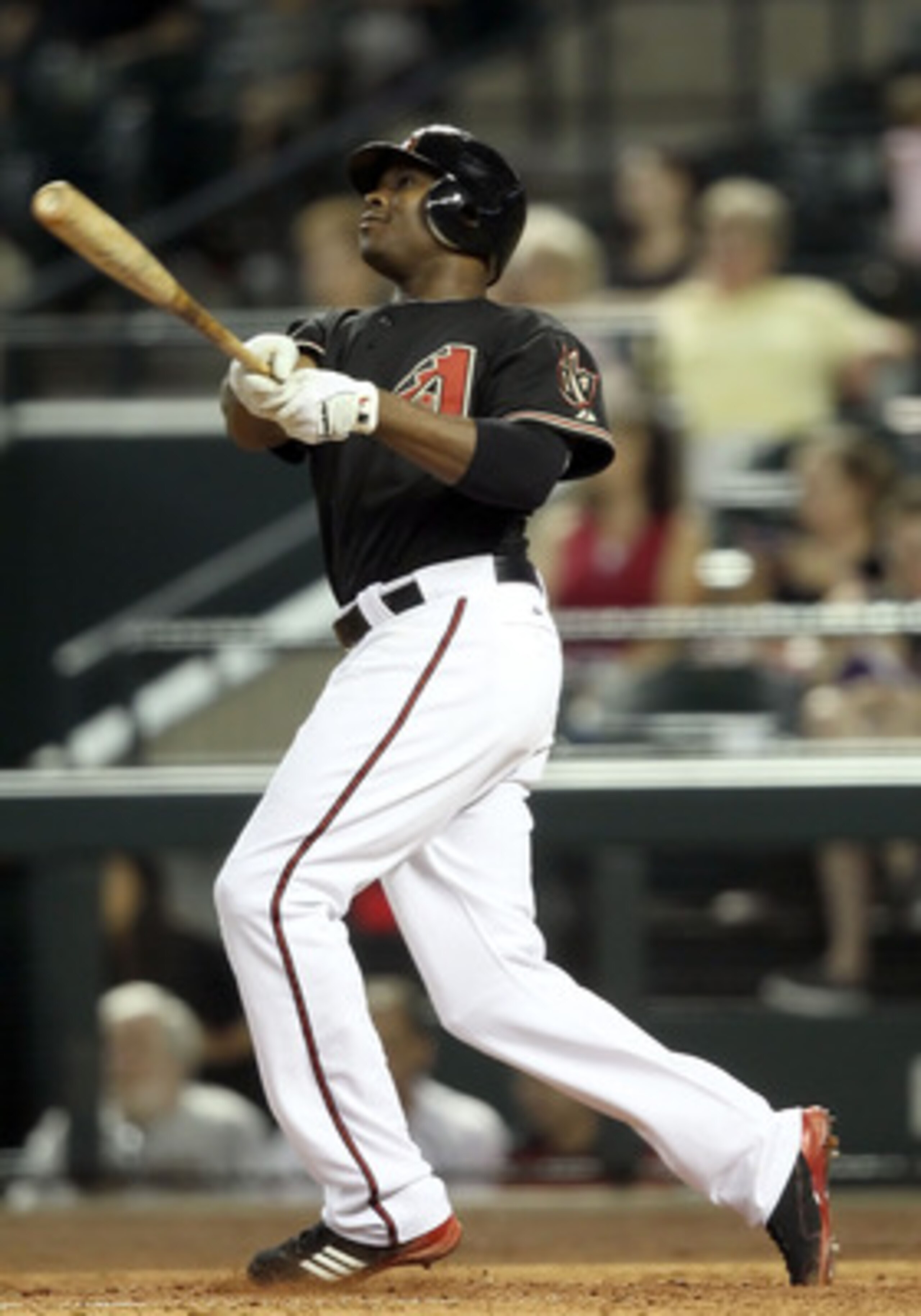 PHOENIX, AZ - JUNE 04:  Justin Upton #10 of the Arizona Diamondbacks bats against the Washington Nationals during the Major League Baseball game at Chase Field on June 4, 2011 in Phoenix, Arizona. The Diamondbacks defeated the Nationals 2-0.  (Photo by Ch