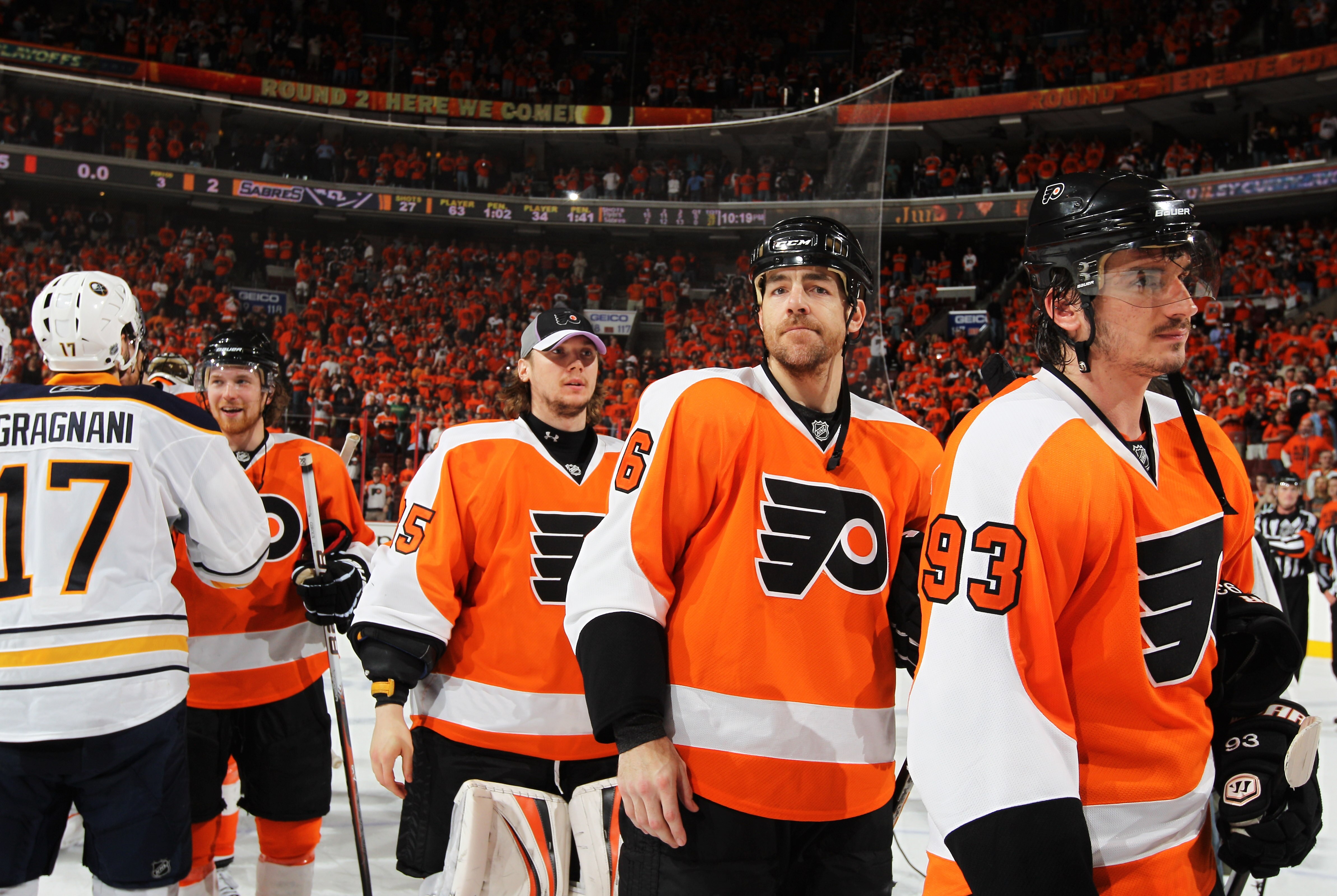 PHILADELPHIA, PA - APRIL 26:  Nikolay Zherdev #93, Sean O'Donnell #6 and Matt Carle #25 of the Philadelphia Flyers skate off the ice after winning Game Seven of the Eastern Conference Quarterfinals against the Buffalo Sabres during the 2011 NHL Stanley Cu