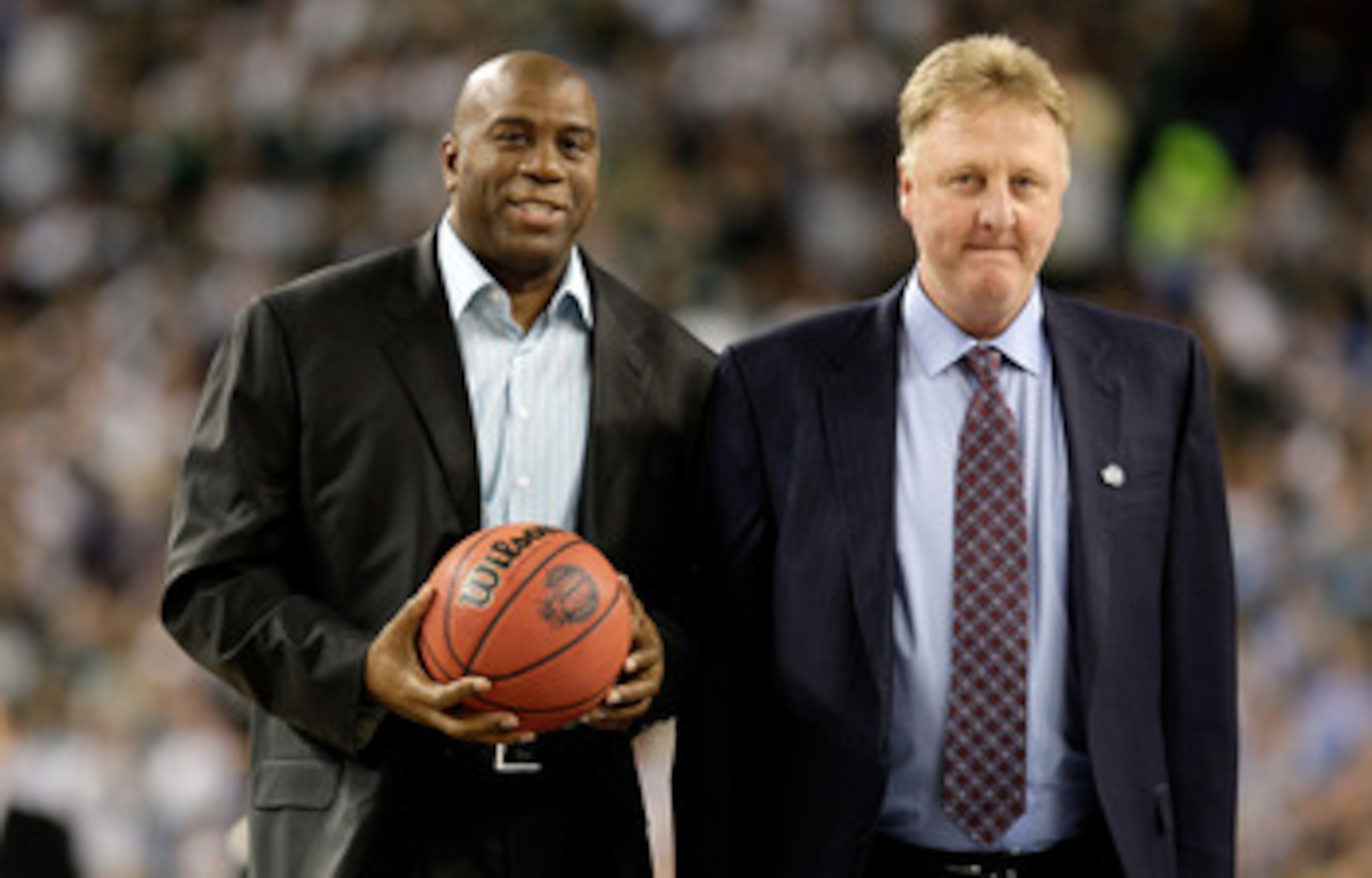 DETROIT - APRIL 06: Larry Bird (R) and Earvin 'Magic' Johnson walk on the court to be honored for the 30th anniversary of their match up in 1979 NCAA Championship Game between Indiana State and Michigan State prior to the Michigan State Spartans playing DETROIT - APRIL 06: Larry Bird (R) and Earvin 'Magic' Johnson walk on the court to be honored for the 30th anniversary of their match up in 1979 NCAA Championship Game between Indiana State and Michigan State prior to the Michigan State Spartans playing