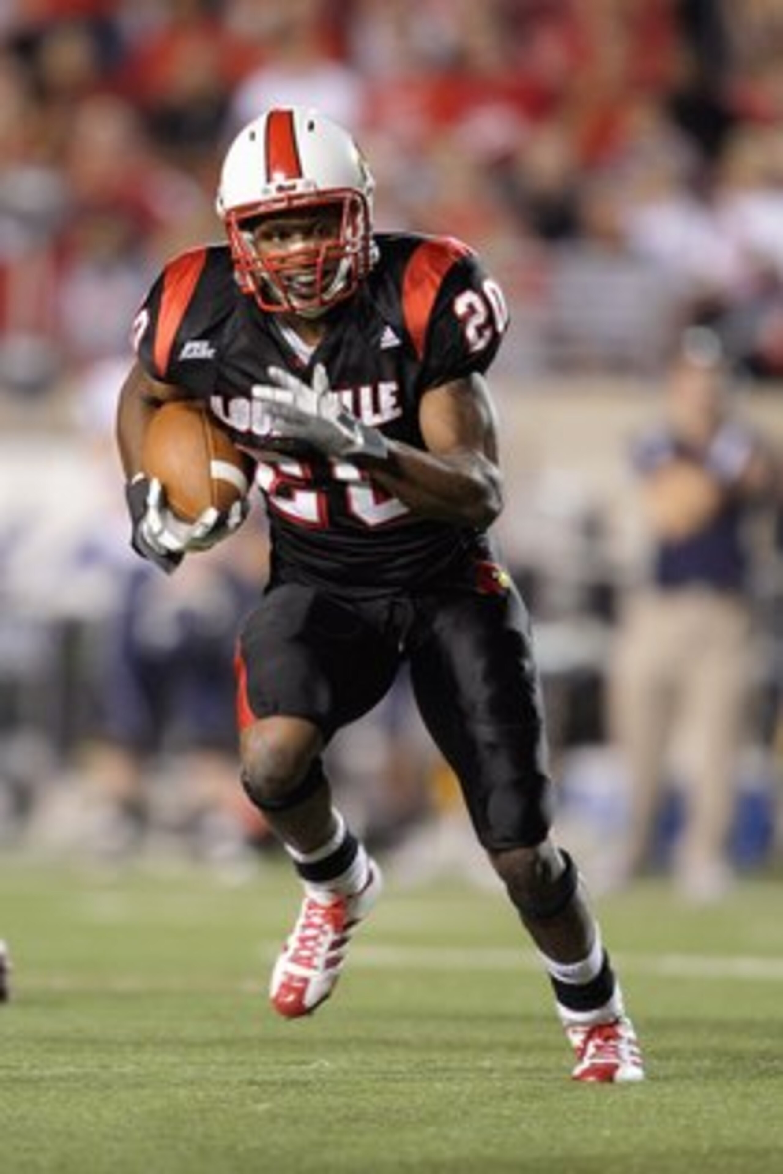 LOUISVILLE, KY - SEPTEMBER 26:  Victor Anderson #20 of the Louisville Cardinals carries the ball during the Big East game against the Connecticut Huskies on September 26, 2008 at Papa John's Stadium in Louisville, Kentucky.  (Photo by Andy Lyons/Getty Ima