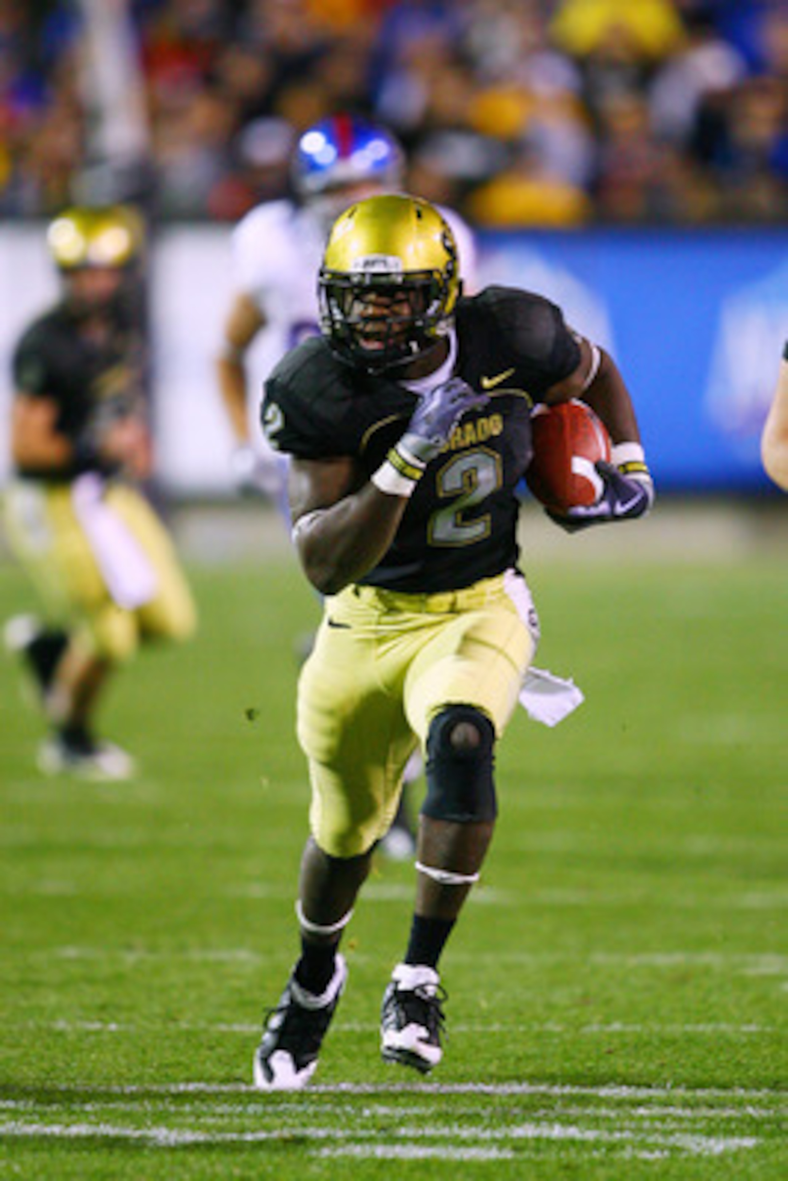 BOULDER, CO - OCTOBER 17: Darrell Scott #2 of the Colorado Buffaloes runs with the ball during the game against the Kansas Jayhawks at Folsom Field on October 17, 2009 in Boulder, Colorado. (Photo by Garrett W. Ellwood/Getty Images)