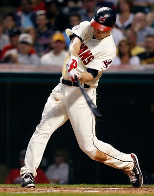 CLEVELAND, OH - JUNE 18:   Grady Sizemore #24 of the Cleveland Indians hits a triple against the Pittsburgh Pirates during the seventh  inning of their game on June 18, 2011 at Progressive Field in Cleveland, Ohio.  The Indians defeated the Pirates 5-1.