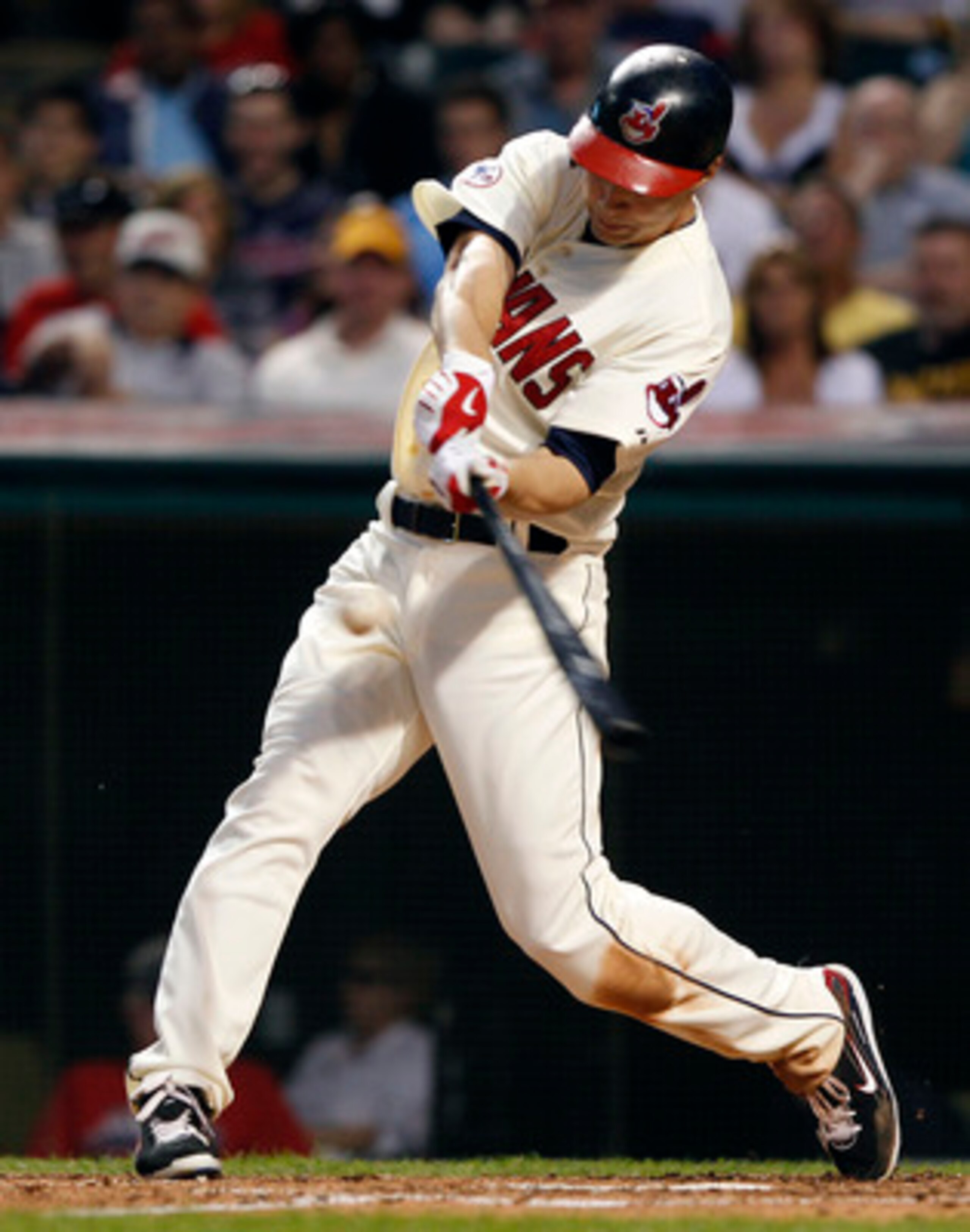 CLEVELAND, OH - JUNE 18:   Grady Sizemore #24 of the Cleveland Indians hits a triple against the Pittsburgh Pirates during the seventh  inning of their game on June 18, 2011 at Progressive Field in Cleveland, Ohio.  The Indians defeated the Pirates 5-1.