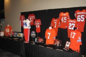 17 Jan 1999:  Terrell Davis #30 of the Denver Broncos stands with Broncos owner Pat Bowlen (L) and John Elway #7 after winning the AFC Championship Game against the New York Jets at Mile High Stadium in Denver, Colorado. The Broncos defeated the Jets 23-1