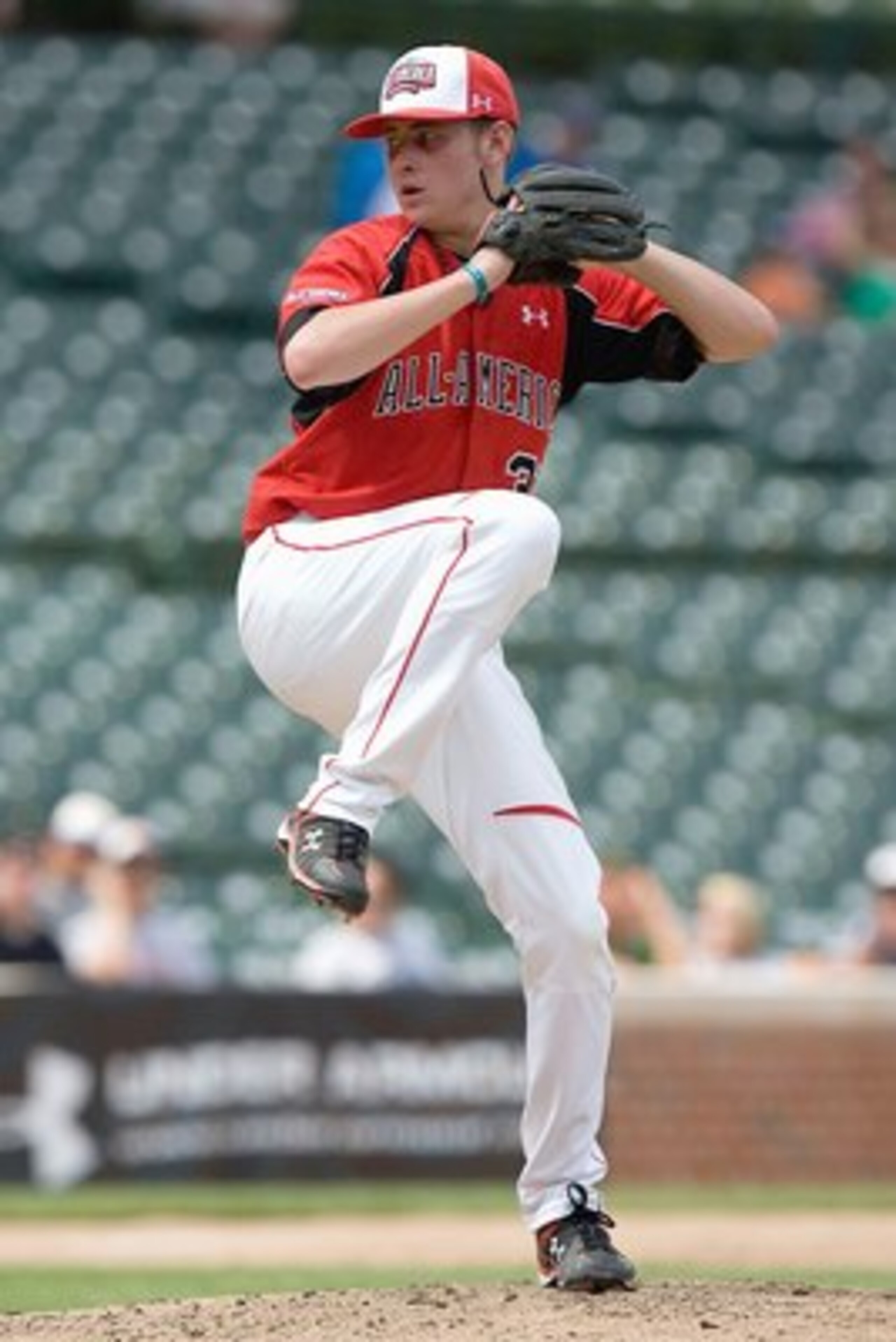 CHICAGO, IL - AUGUST 17: Tyler Matzek #31 of the Team One team (red jersey) pitches against of the Baseball Factory team during the Under Armour All-America Baseball Game at Wrigley Field on August 17, 2008 in Chicago, Illinois. (Photo by Dilip Vishwanat CHICAGO, IL - AUGUST 17: Tyler Matzek #31 of the Team One team (red jersey) pitches against of the Baseball Factory team during the Under Armour All-America Baseball Game at Wrigley Field on August 17, 2008 in Chicago, Illinois. (Photo by Dilip Vishwanat