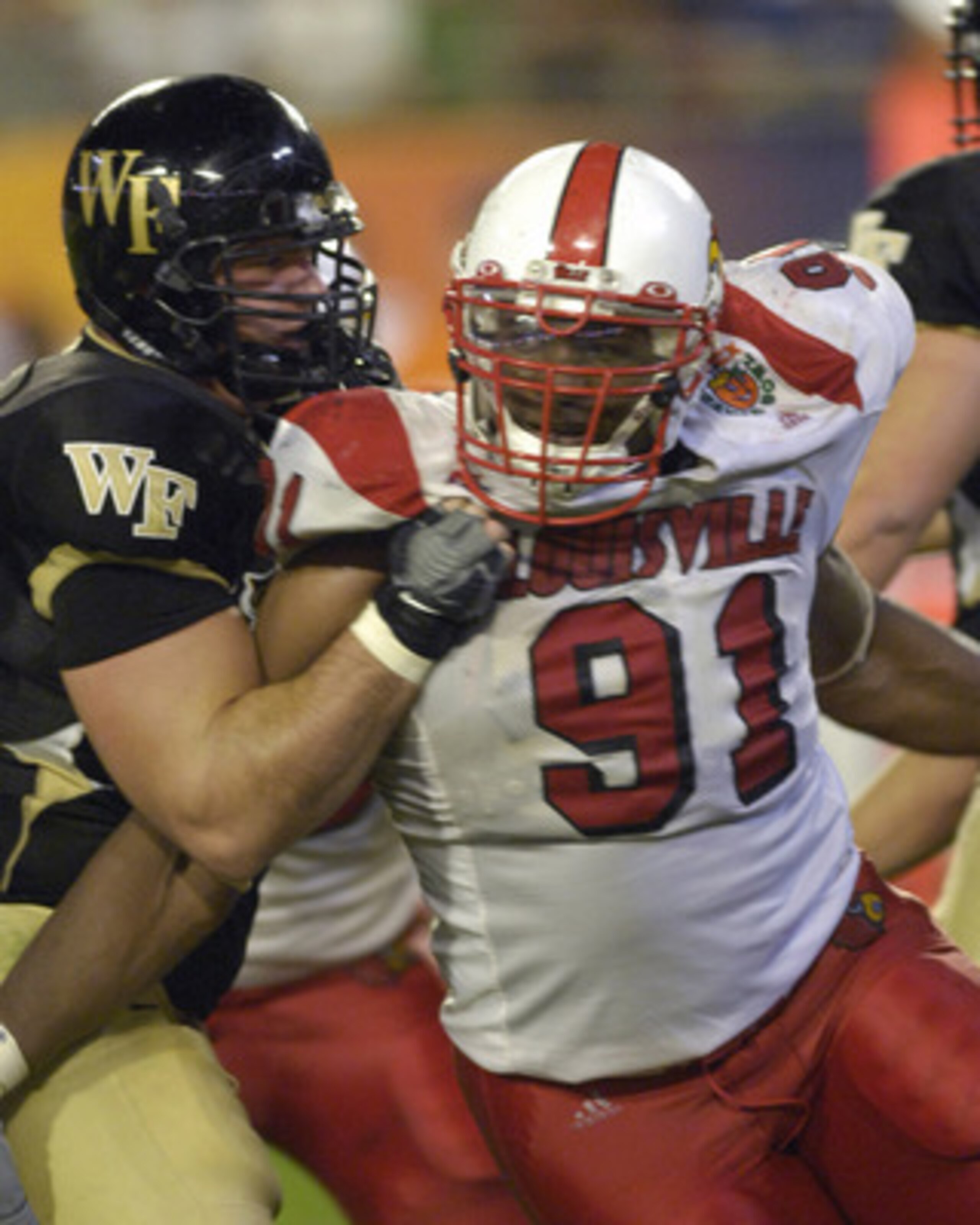 Louisville defensive tackle Amobi Okoye during the 73rd annual FedEx Orange Bowl between Louisville and Wake Forest at Dolphin Stadium in Miami, Florida on January 2, 2007. (Photo by A. Messerschmidt/Getty Images)