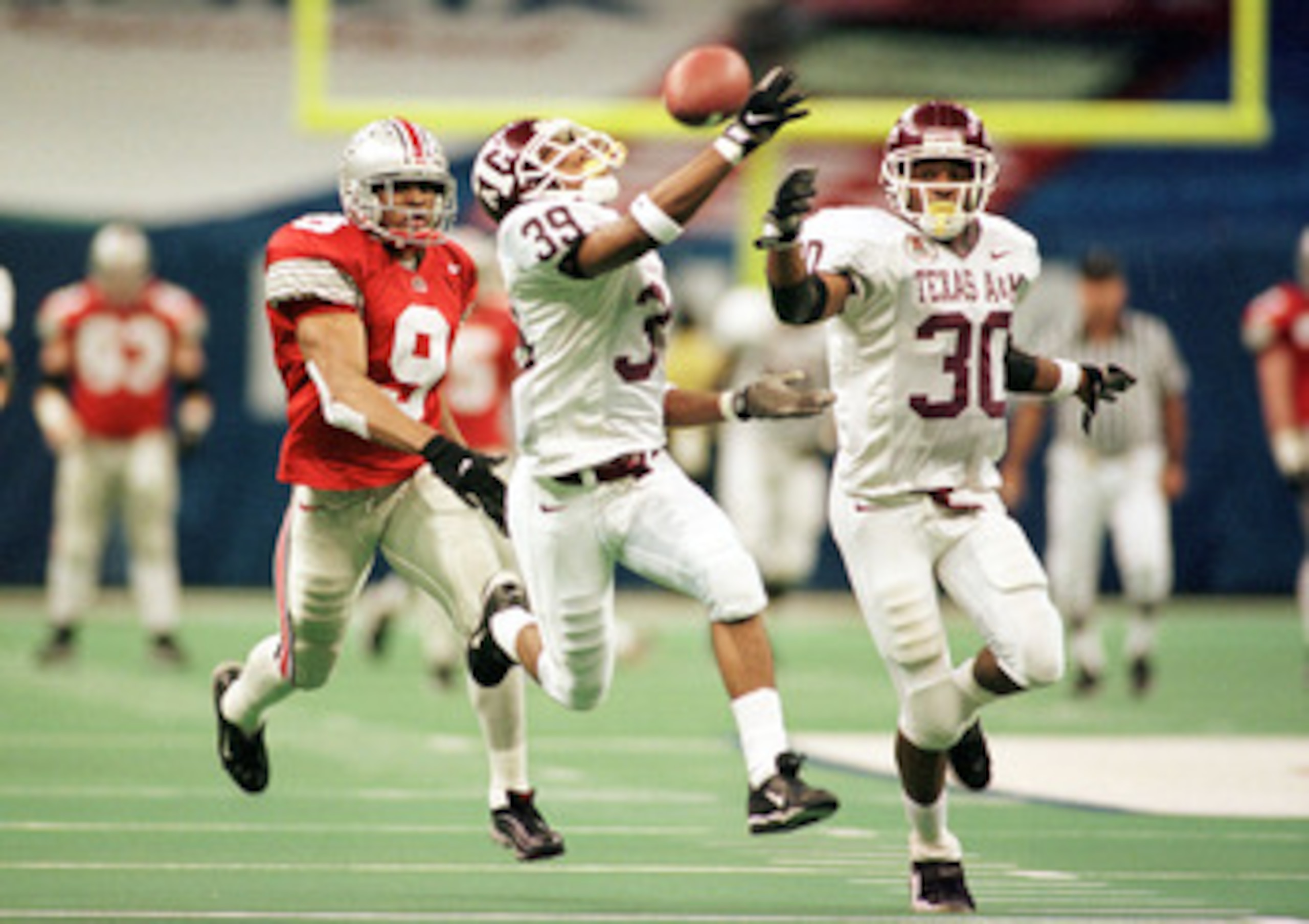 1 Jan 1999:  Jason Webster #39 of Texas A&M breaks up a pass intended for David Boston #9 of Ohio State during the Nokia Sugar Bowl at the Superdome in New Orleans, Louisiana. Mandatory Credit: Matthew Stockman/ALLSPORT