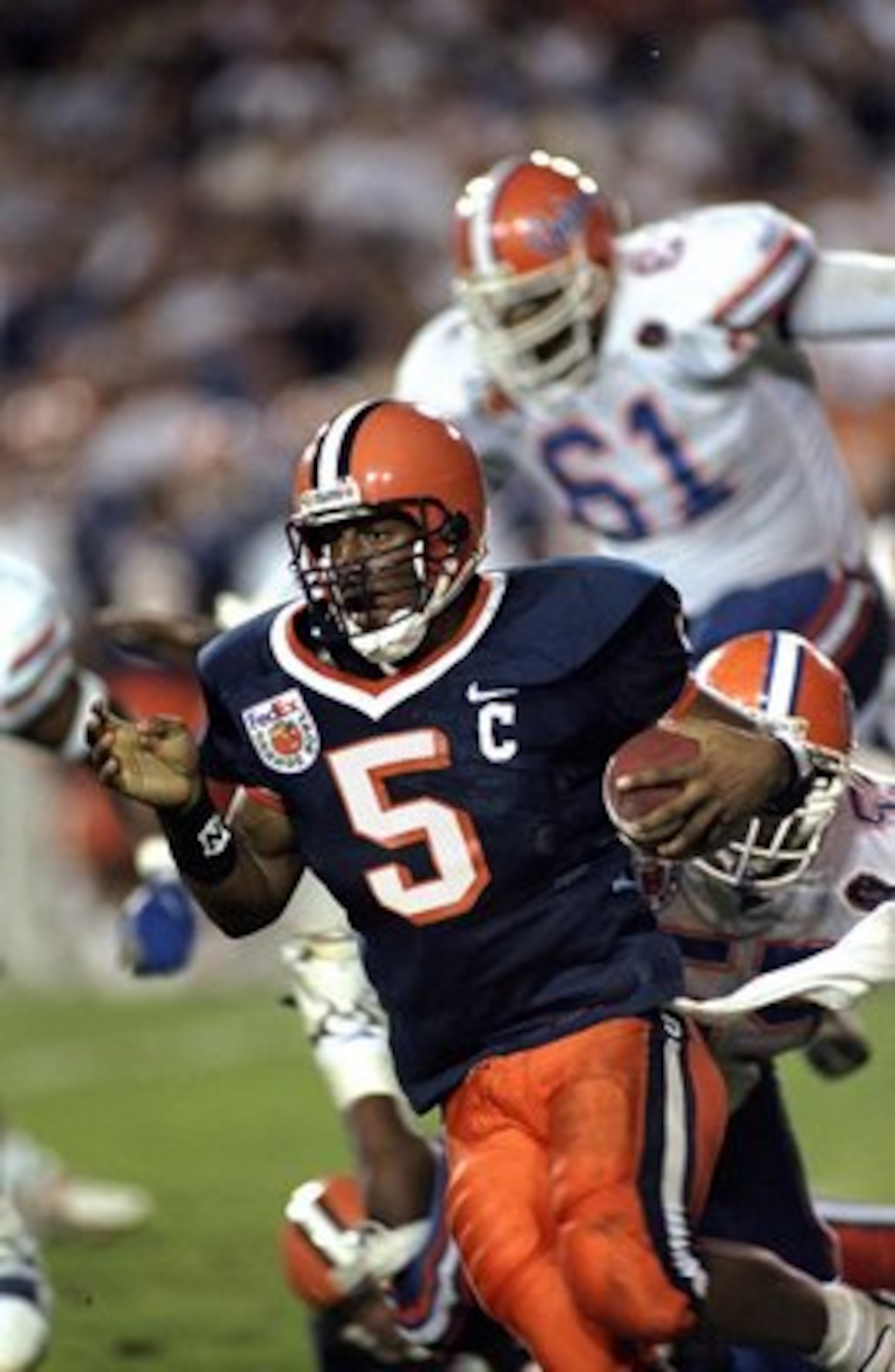 1 Jan 1999: Donovan McNabb #5 of the Syracuse Orangeman carries the ball during the Orange Bowl against the Florida Gators at the Orange Bowl in Miami, Florida. Florida defeated Syracuse 31-10. Mandatory Credit: Scott Halleran  /Allsport