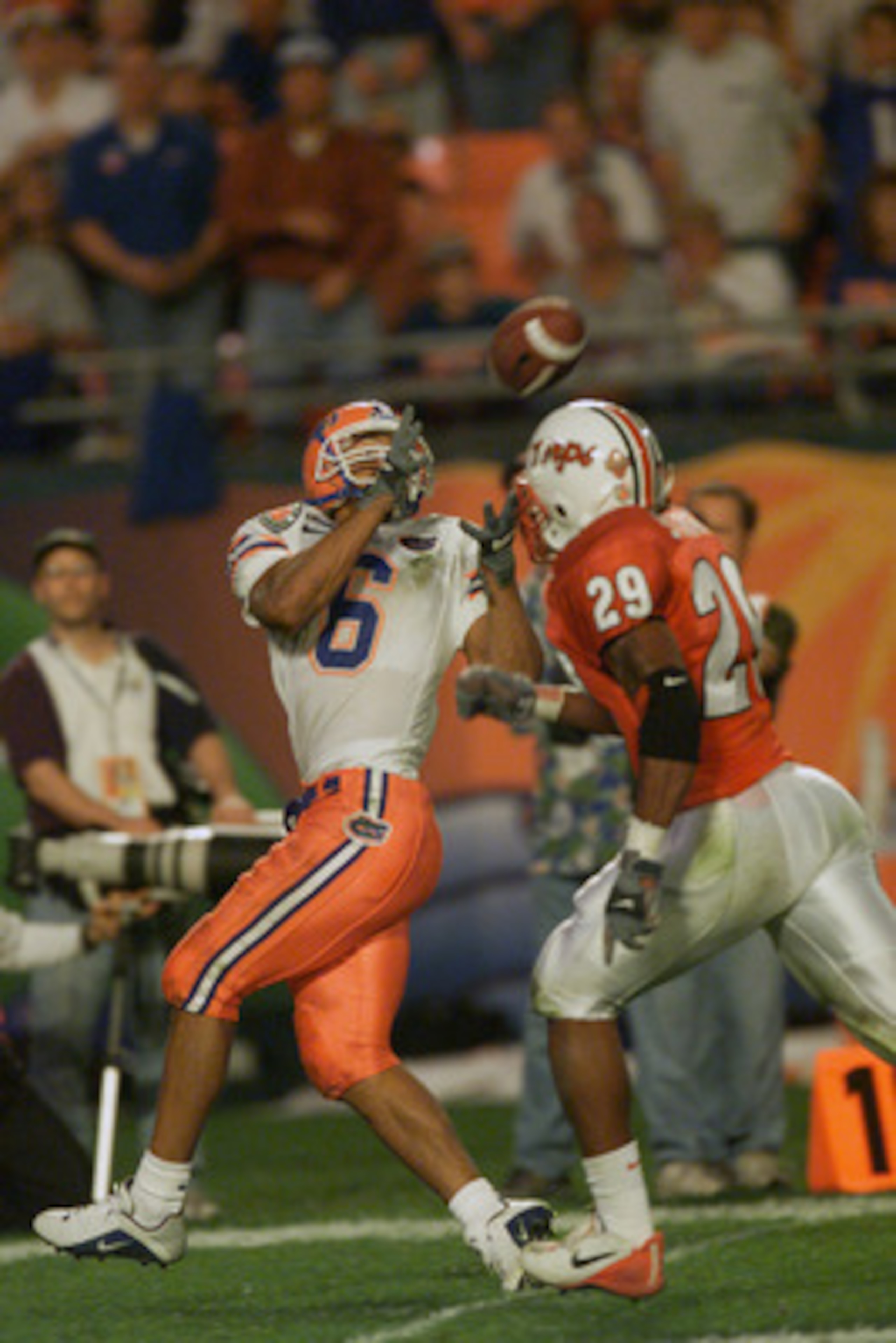 02 Jan 2002:  Taylor Jacobs #6 of Florida scores a touchdown over Tyrone Stewart #29 of Maryland in the first quarter in the Orange Bowl at Pro Player Stadium in Miami, Florida.  Florida won 56-23. DIGITAL IMAGE Mandatory Credit: Eliot Schechter/Getty Ima