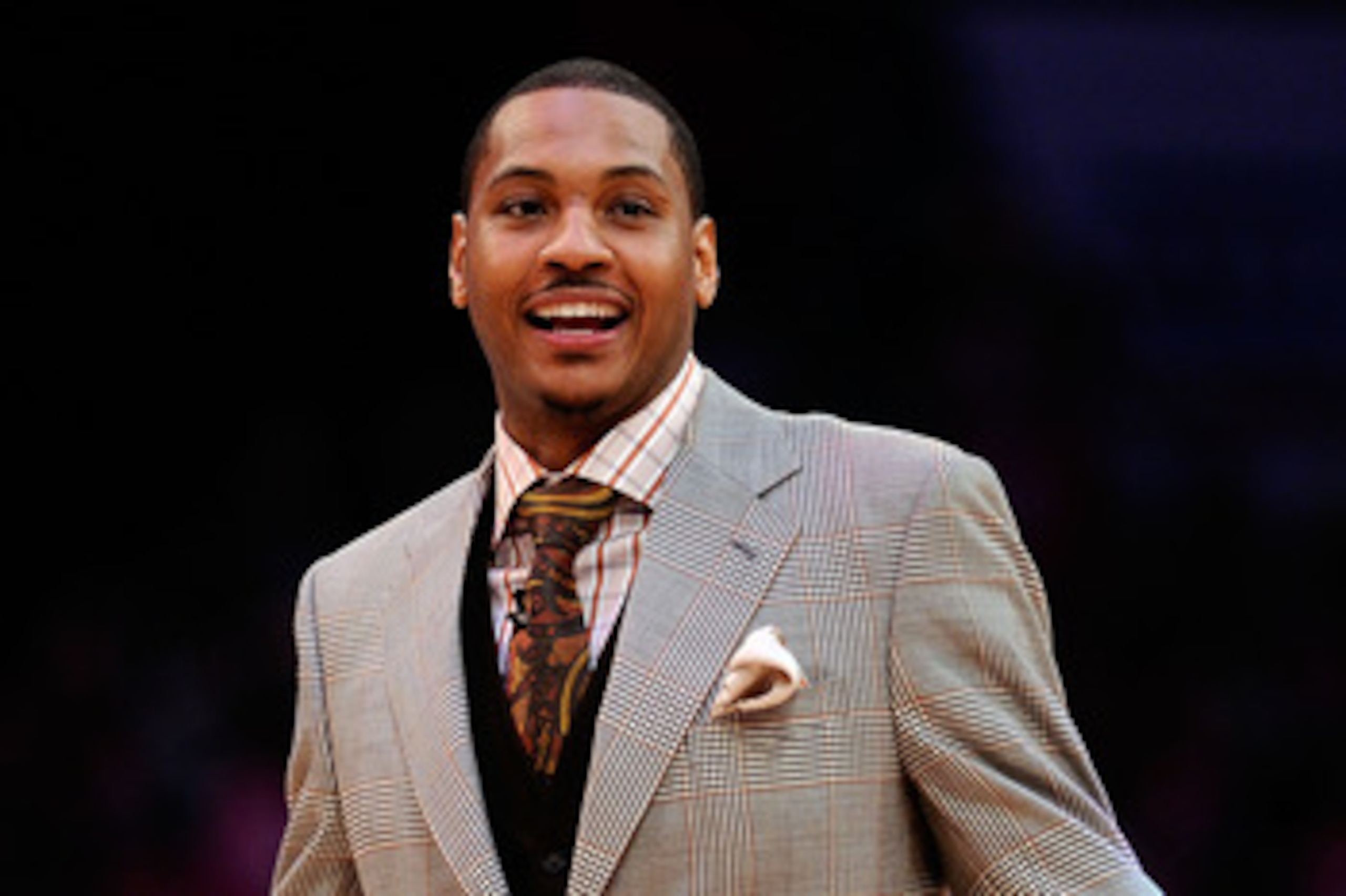 LOS ANGELES, CA - FEBRUARY 18:  Carmelo Anthony of the Denver Nuggets reacts as he takes his seat to watch the T-Mobile Rookie Challenge and Youth Jam at Staples Center on February 18, 2011 in Los Angeles, California.  (Photo by Kevork Djansezian/Getty Im