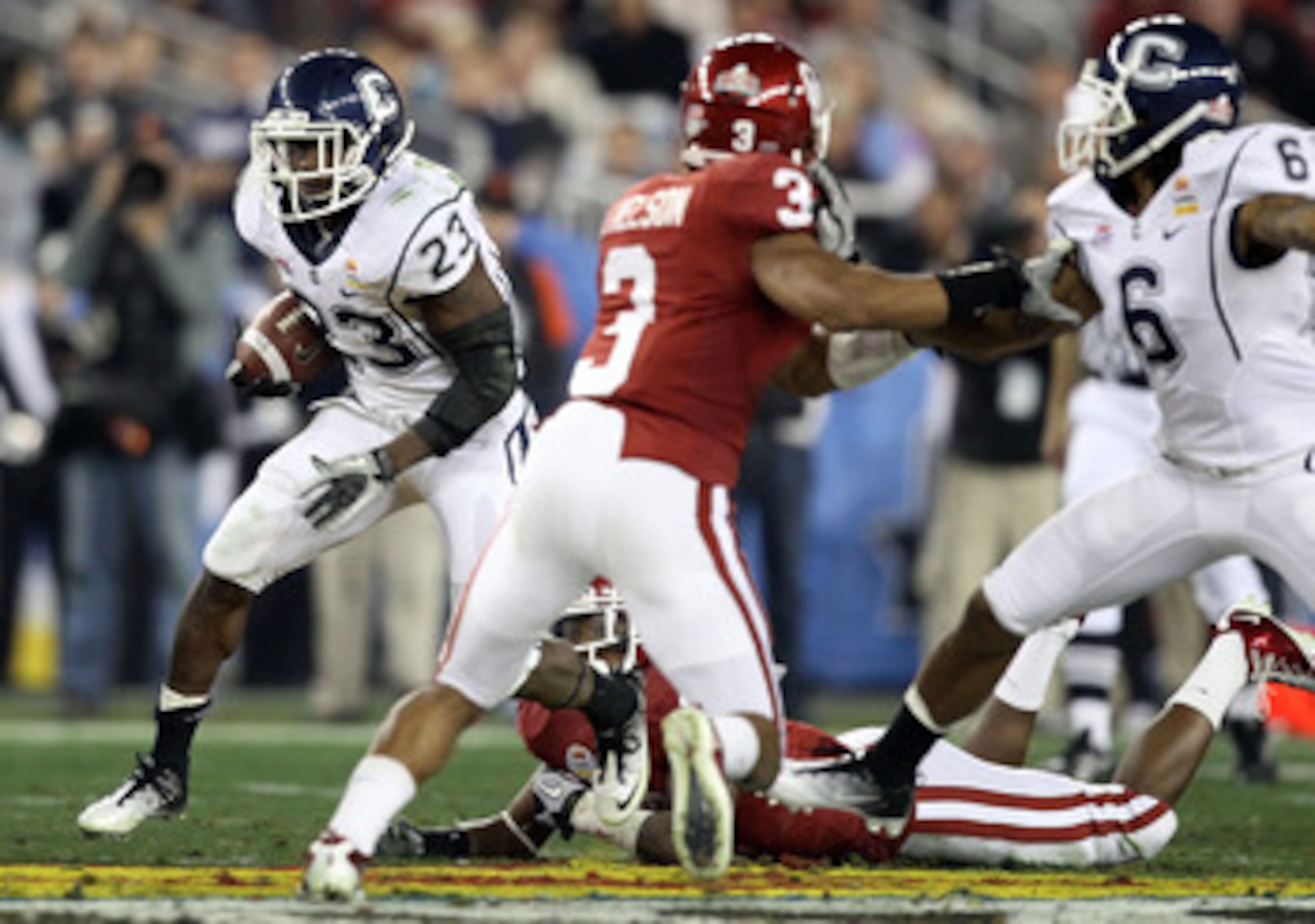 GLENDALE, AZ - JANUARY 01:  Jordan Todman #23 of the Connecticut Huskies runs the ball during the Tostitos Fiesta Bowl at the Universtity of Phoenix Stadium on January 1, 2011 in Glendale, Arizona.  (Photo by Christian Petersen/Getty Images)