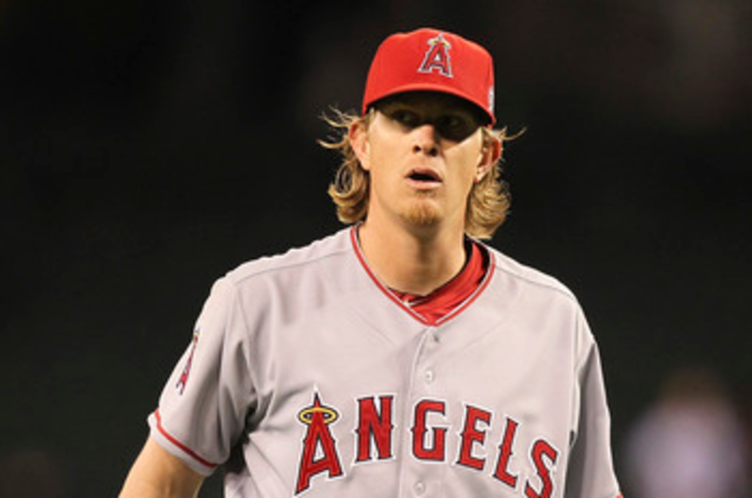 SEATTLE - JUNE 14:  Starting pitcher Jered Weaver #36 of the Los Angeles Angels of Anaheim reacts as the final out is made in a complete game 4-0 shutout against the Seattle Mariners at Safeco Field on June 14, 2011 in Seattle, Washington. (Photo by Otto