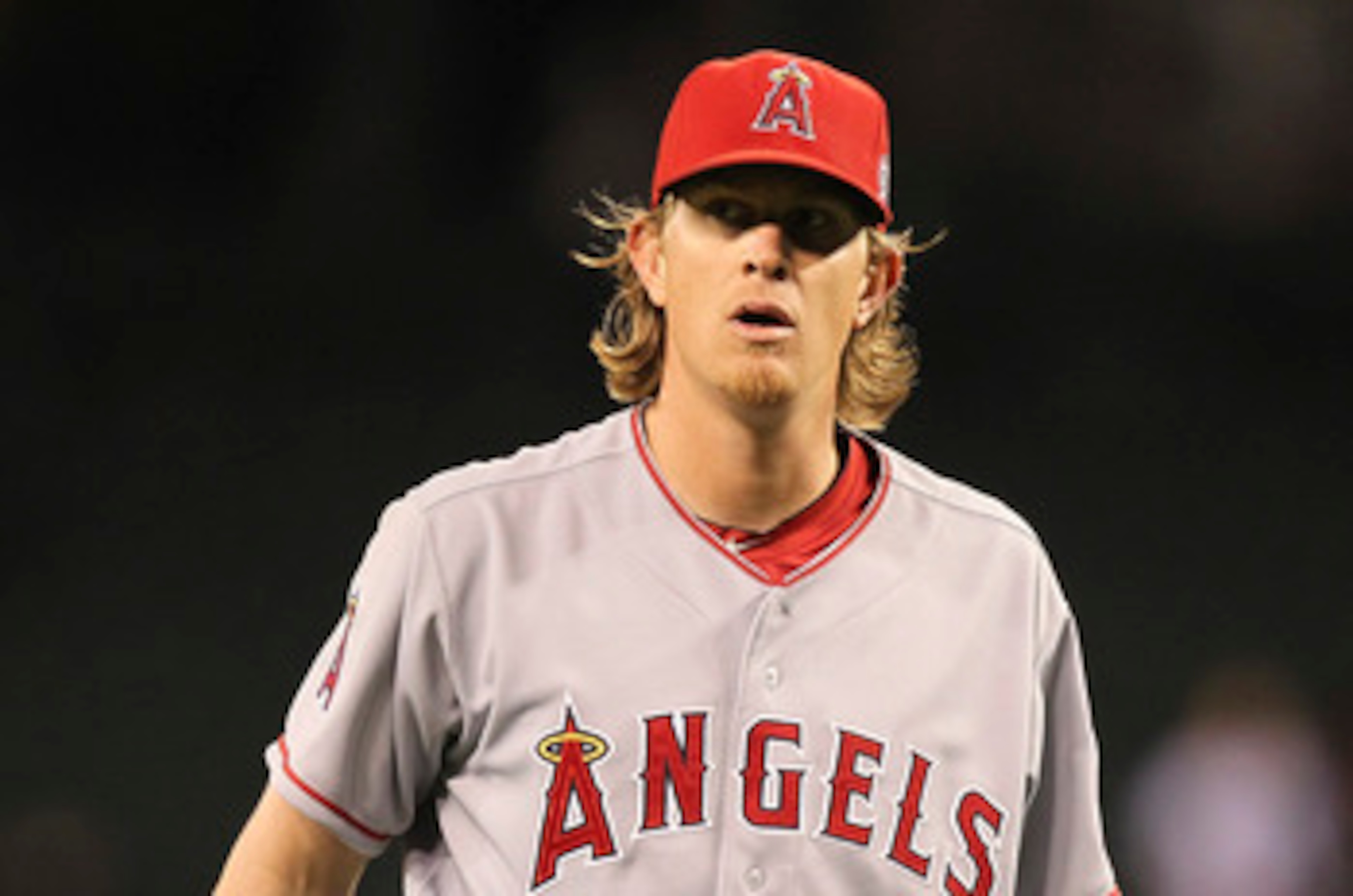 SEATTLE - JUNE 14:  Starting pitcher Jered Weaver #36 of the Los Angeles Angels of Anaheim reacts as the final out is made in a complete game 4-0 shutout against the Seattle Mariners at Safeco Field on June 14, 2011 in Seattle, Washington. (Photo by Otto