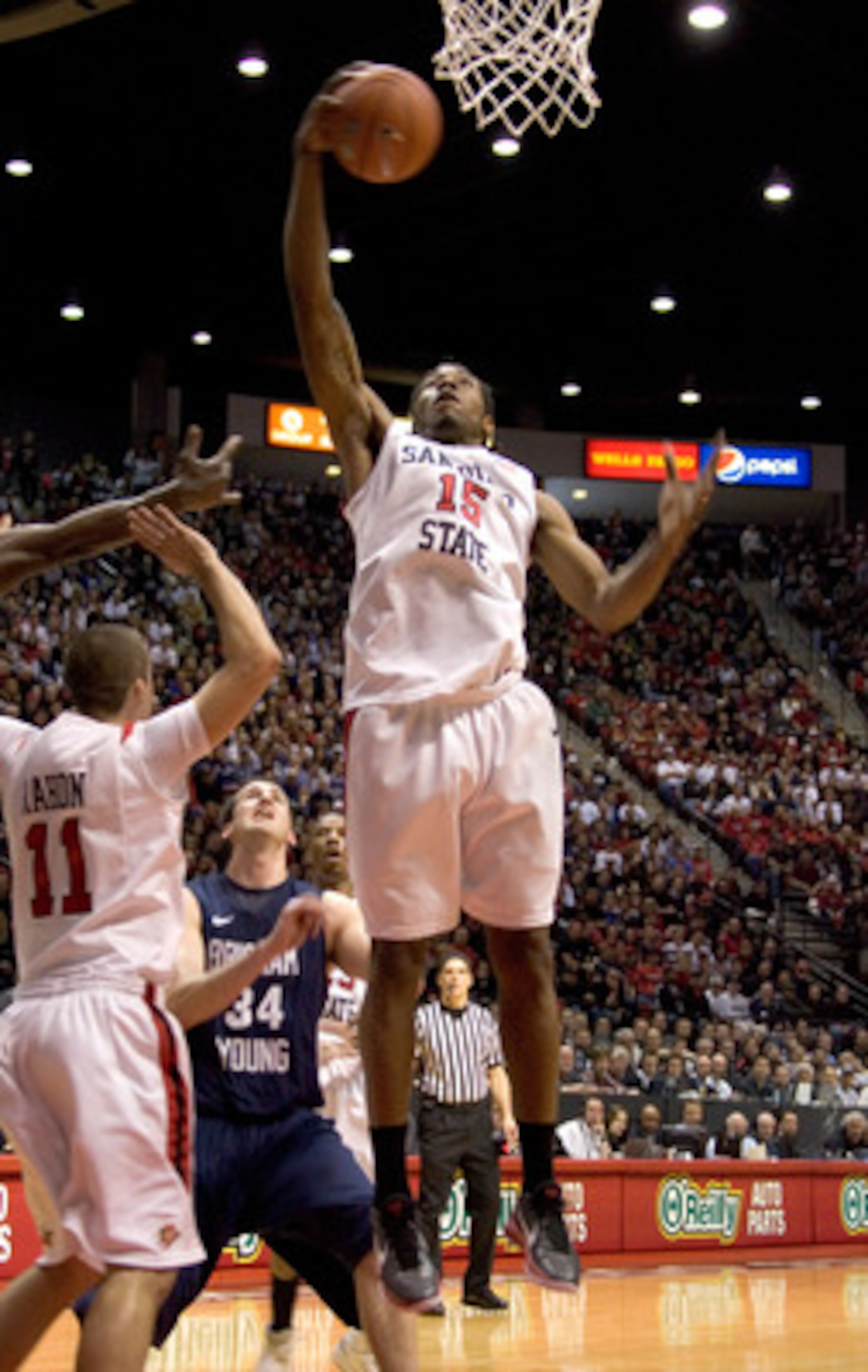 SAN DIEGO, CA - FEBRUARY 26: Kawhi Leonard #15 of the San Diego State Aztecs rebounds the ball against the Brigham Young Cougars during the first half at Cox Arena on February 26, 2011 in San Diego, California. (Photo by Kent Horner/Getty Images)