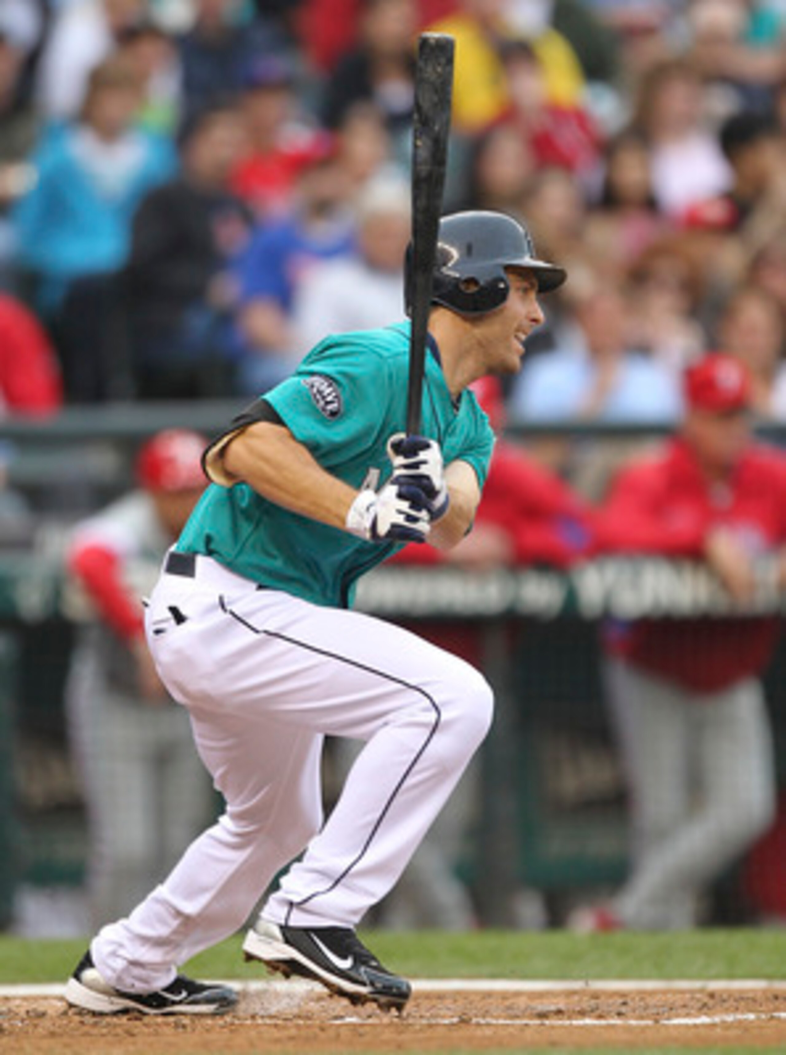 SEATTLE - JUNE 17:  Dustin Ackley #13 of the Seattle Mariners singles in the second inning against the Philadelphia Phillies at Safeco Field on June 17, 2011 in Seattle, Washington. (Photo by Otto Greule Jr/Getty Images)