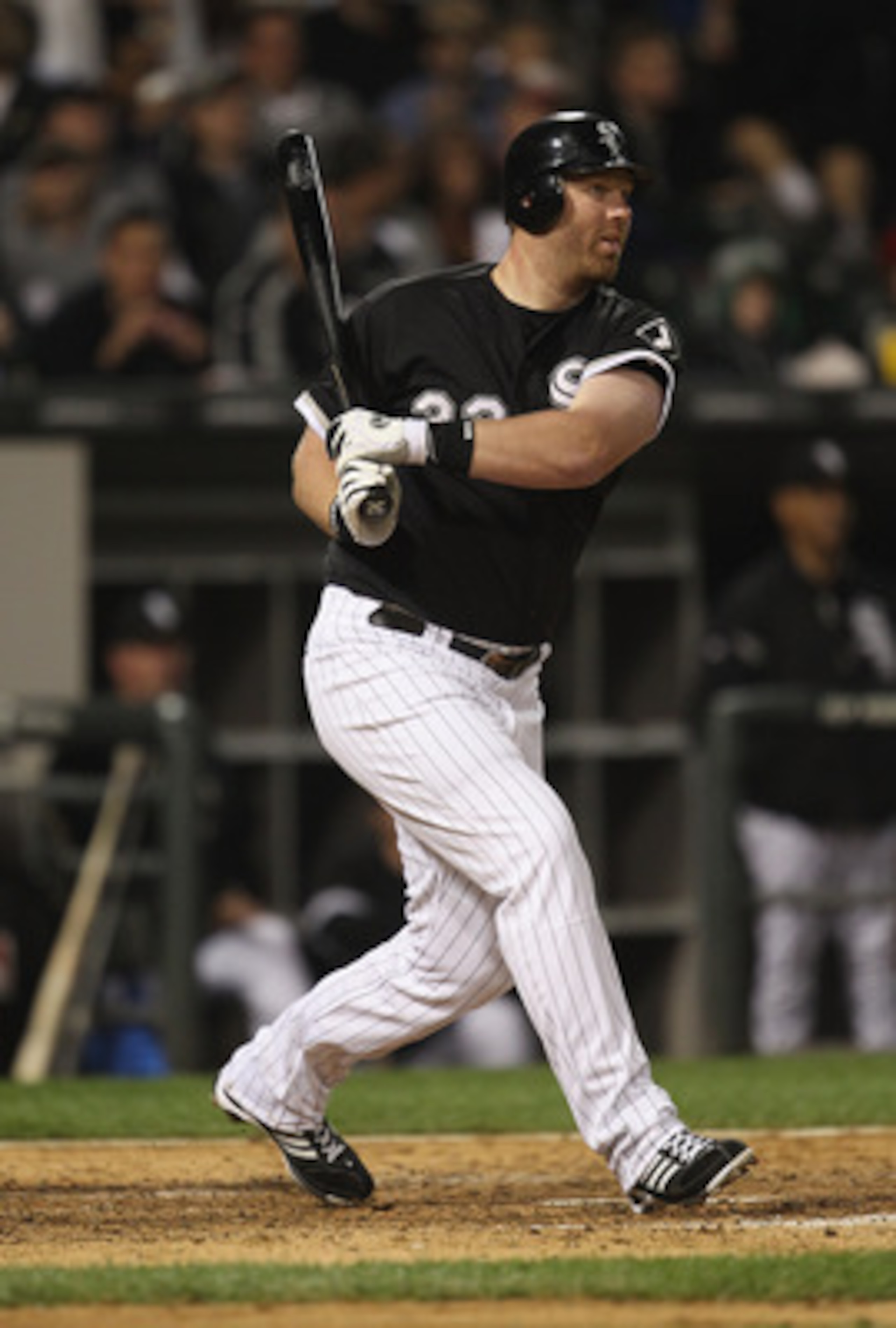 CHICAGO, IL - JUNE 10:  Adam Dunn #32 of the Chicago White Sox hits the ball against the Oakland Athletics at U.S. Cellular Field on June 10, 2011 in Chicago, Illinois. The Athletics defeated the White Sox 7-5.  (Photo by Jonathan Daniel/Getty Images)