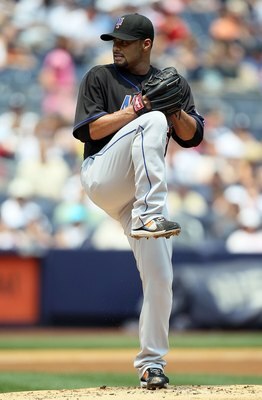 NEW YORK - JUNE 20:  Johan Santana #57 of the New York Mets delivers a pitch against the New York Yankees on June 20, 2010 at Yankee Stadium in the Bronx borough of New York City.  (Photo by Jim McIsaac/Getty Images)