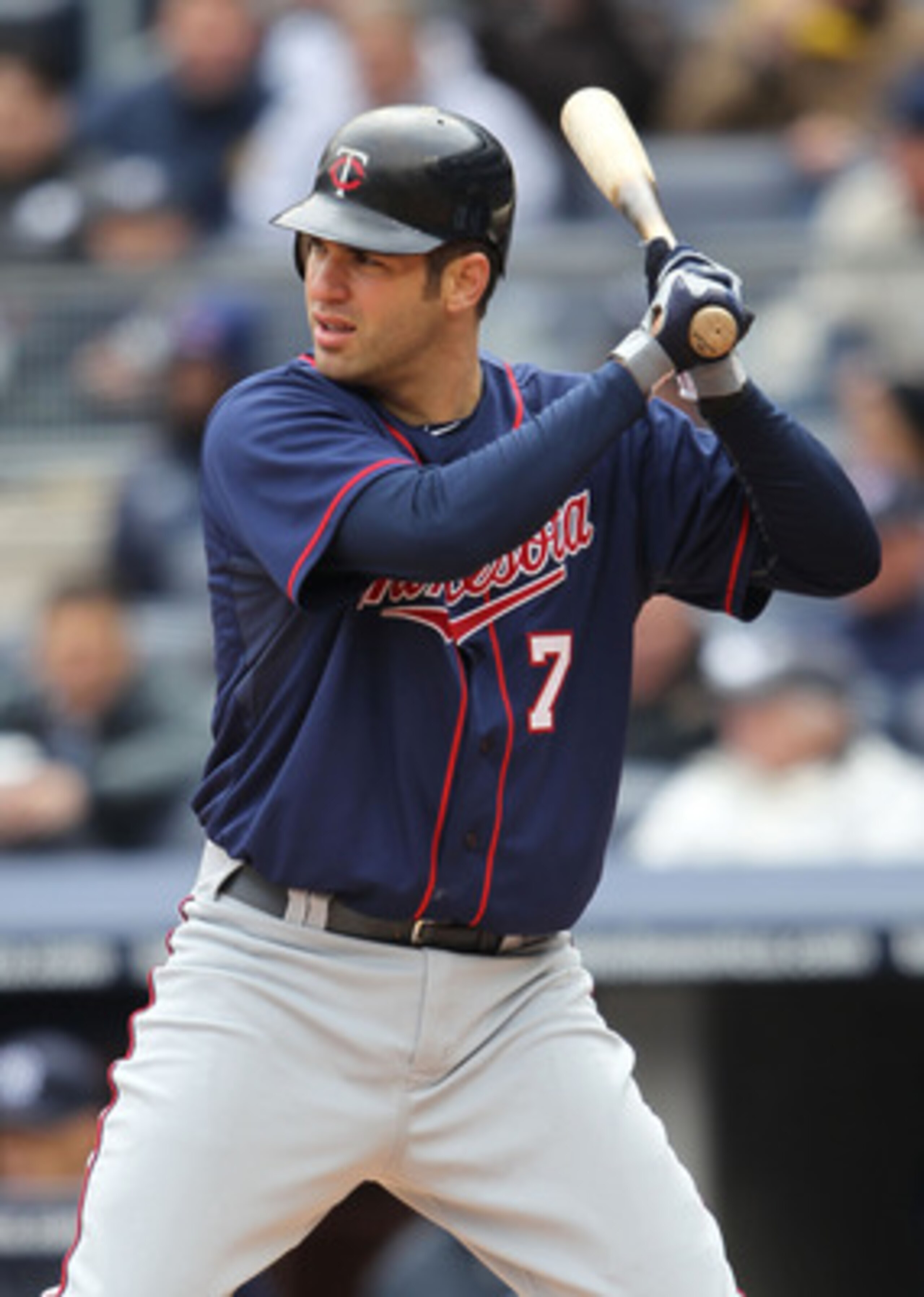NEW YORK, NY - APRIL 07:  Joe Mauer #7 of the Minnesota Twins against New York Yankees at Yankee Stadium on April 7, 2011 in the Bronx borough of New York City.  (Photo by Nick Laham/Getty Images)
