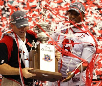 NEW ORLEANS - JANUARY 02:  Head coach Kyle Whittingham and quarterback Brian Johnson #3 of the Utah Utes celebrates after defeating the Alabama Crimson Tide 31-17 during the 75th Allstate Sugar Bowl at the Louisiana Superdome on January 2, 2009 in New Orl