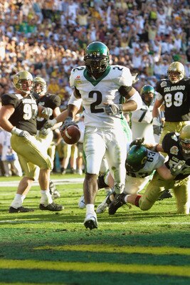 01 Jan 2002 : Onterrio Smith of Oregon carries the ball against Colorado during the game at the  Fiesta Bowl at Sun Devil Stadium in Tempe, Arizona. The Oregon Ducks won 38-16. DIGITAL IMAGE. Mandatory Credit: Jeff Gross/Getty Images