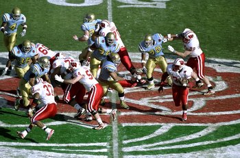 1 Jan 1999:  Ron Dayne #33 of the Wisconsin Badgers in action during the Rose Bowl Game against the UCLA Bruins at the Rose Bowl in Pasadena, California. The Badgers defeated the Bruins 38-31. Mandatory Credit: Donald Miralle  /Allsport