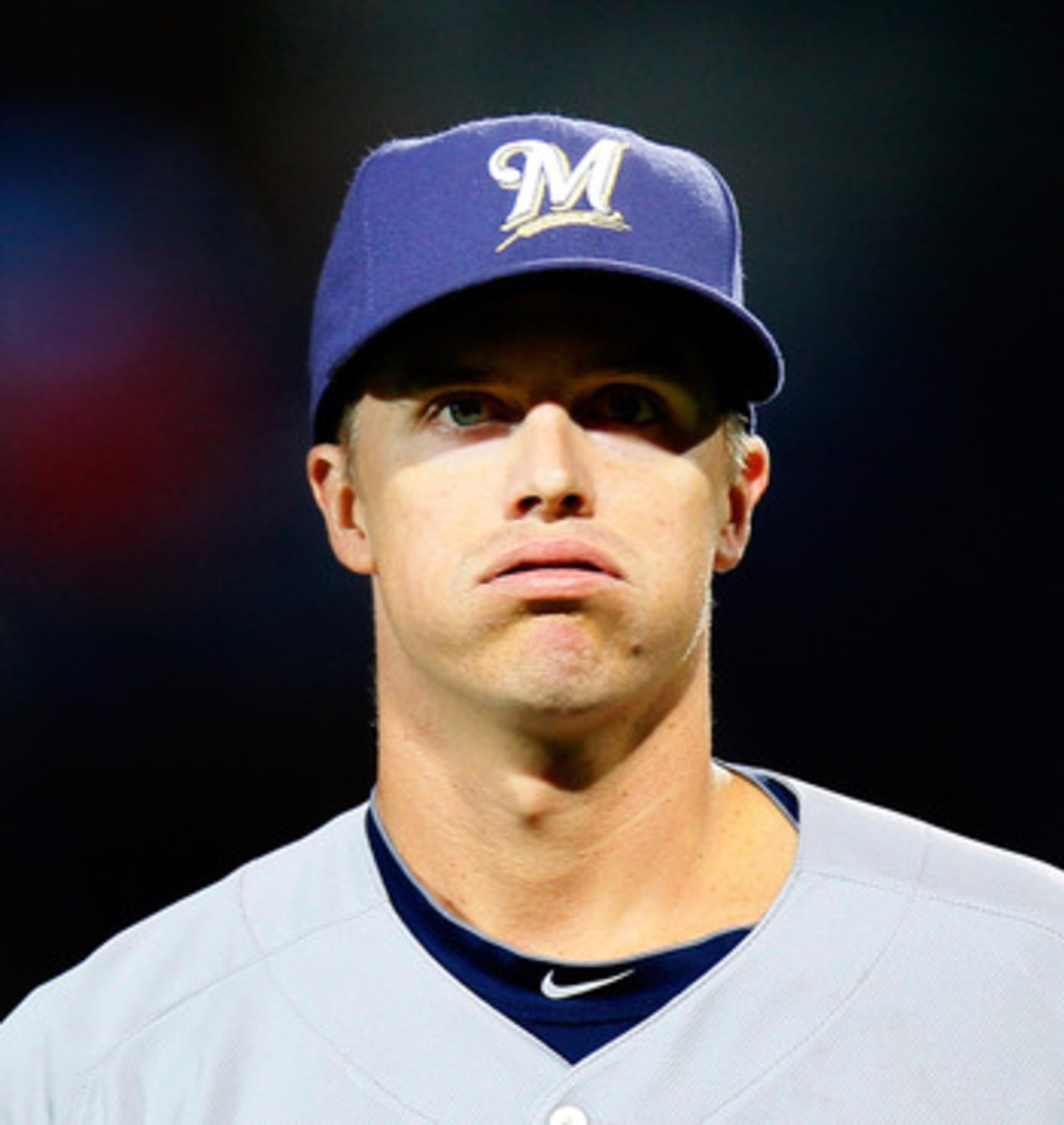 ATLANTA, GA - MAY 04:  Zack Greinke #13 of the Milwaukee Brewers walks off the field after pitching in the second inning against the Atlanta Braves at Turner Field on May 4, 2011 in Atlanta, Georgia.  (Photo by Kevin C. Cox/Getty Images)