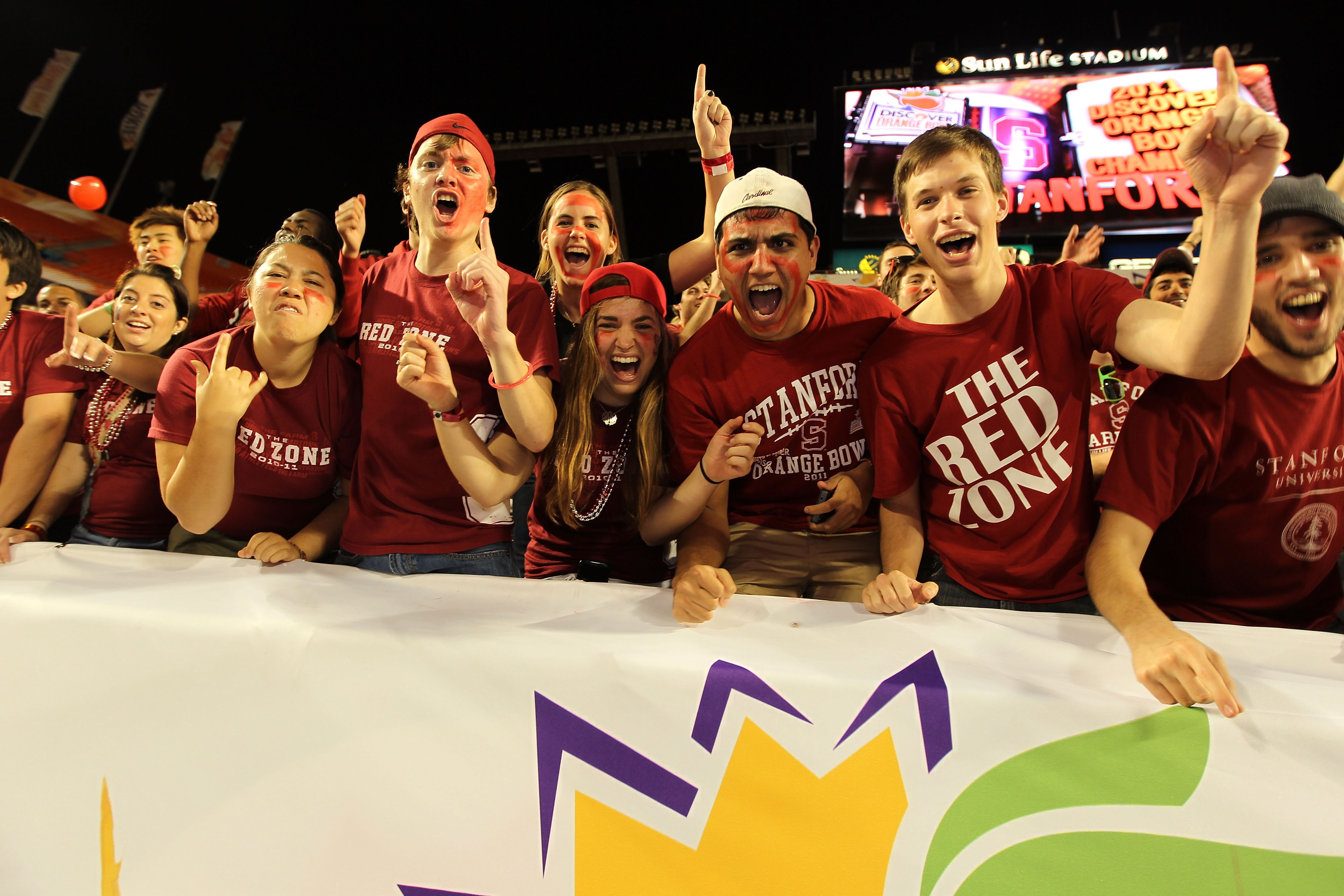 MIAMI, FL - JANUARY 03:  Fans of the Stanford Cardinal celebrate after Stanford won 40-12 against the Virginia Tech Hokies during the 2011 Discover Orange Bowl at Sun Life Stadium on January 3, 2011 in Miami, Florida.  (Photo by Mike Ehrmann/Getty Images)