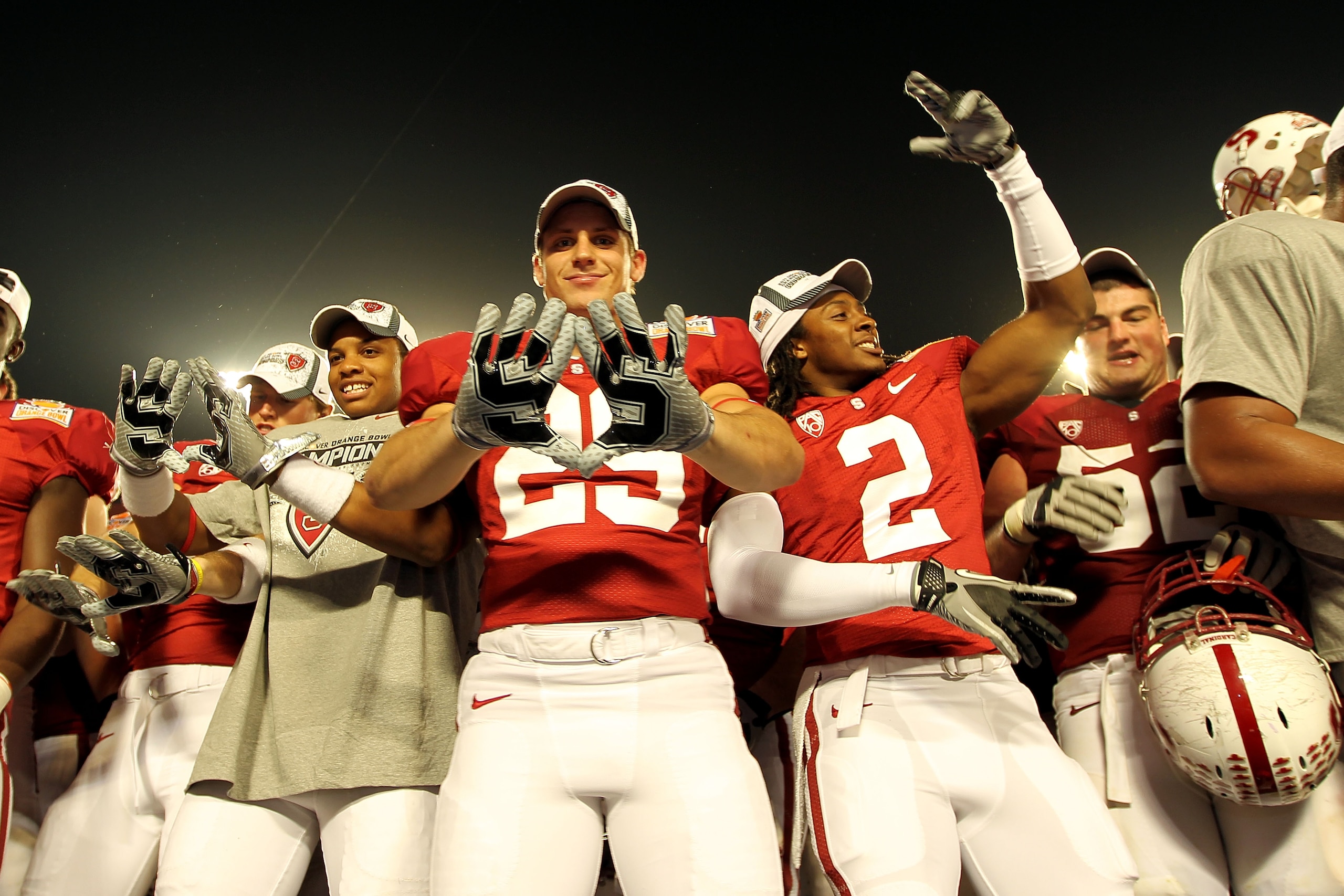 MIAMI, FL - JANUARY 03:  Ed Reynolds #29 and Corey Galewood #2 of the Stanford Cardinal celebrates after Stanford won 40-12 against the Virginia Tech Hokies during the 2011 Discover Orange Bowl at Sun Life Stadium on January 3, 2011 in Miami, Florida.  (P