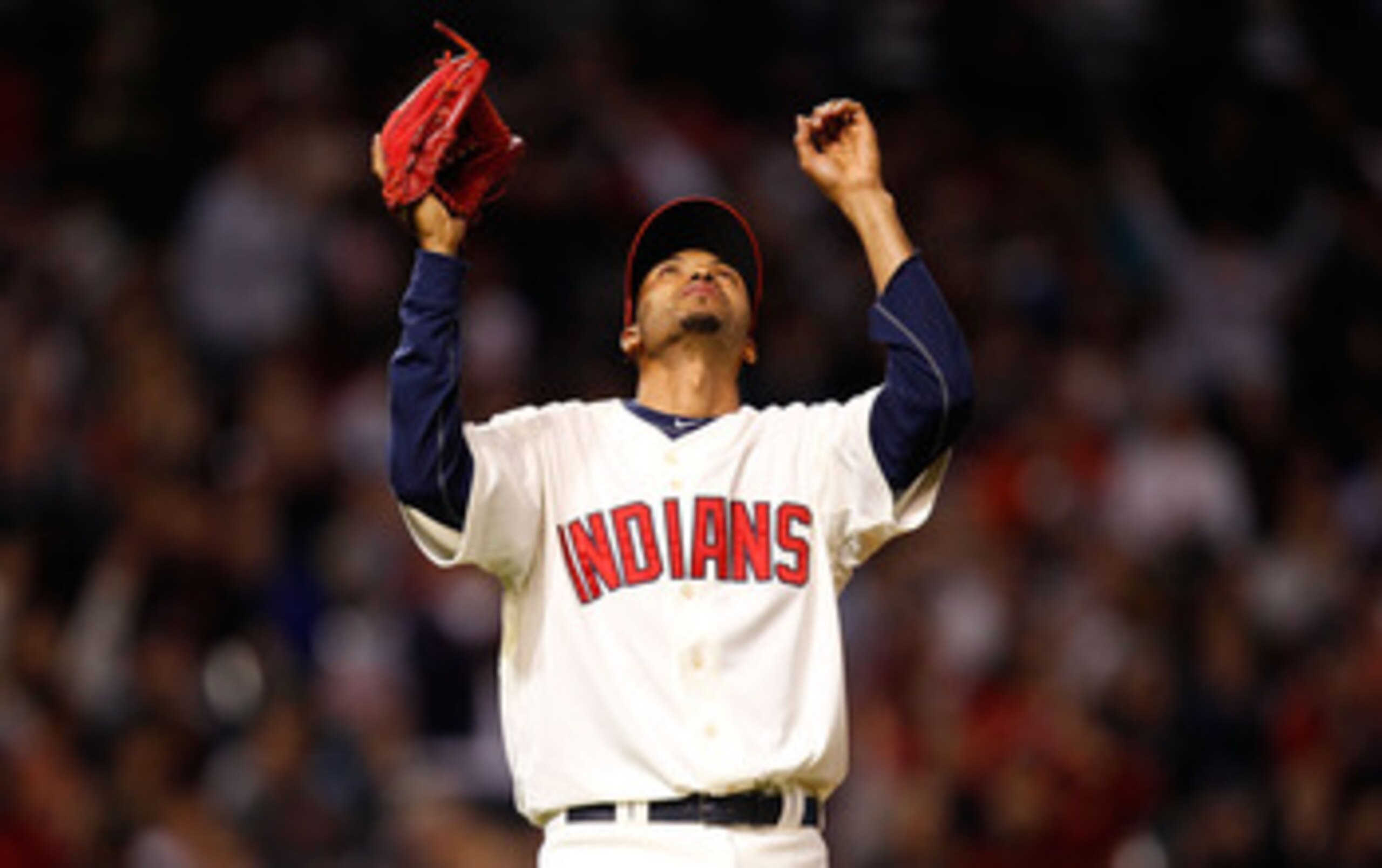 CLEVELAND - APRIL 30:  Rafael Perez #53 of the Cleveland Indians celebrates after completing an inning against the Detroit Tigers during the game on April 30, 2011 at Progressive Field in Cleveland, Ohio.  (Photo by Jared Wickerham/Getty Images)