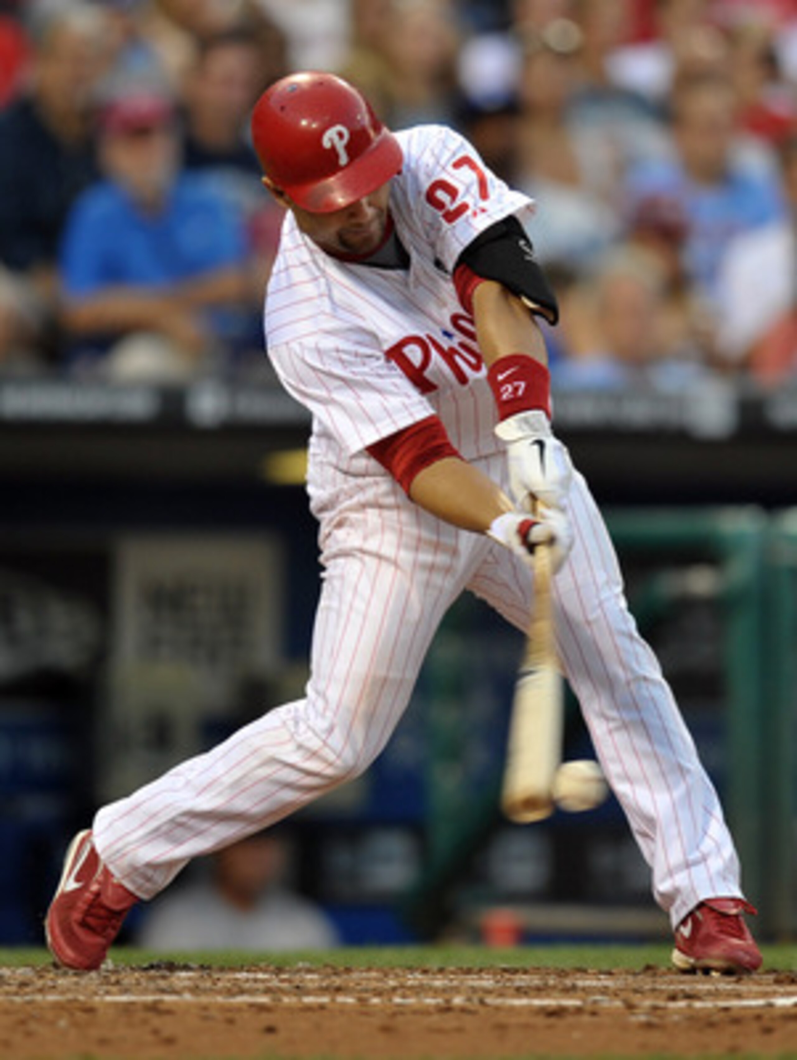 PHILADELPHIA, PA - JUNE 06: Placido Polanco #27 of the Philadelphia Phillies hits a one-run single during the game against the  Los Angeles Dodgers at Citizens Bank Park on June 6, 2011 in Philadelphia, Pennsylvania. (Photo by Drew Hallowell/Getty Images)