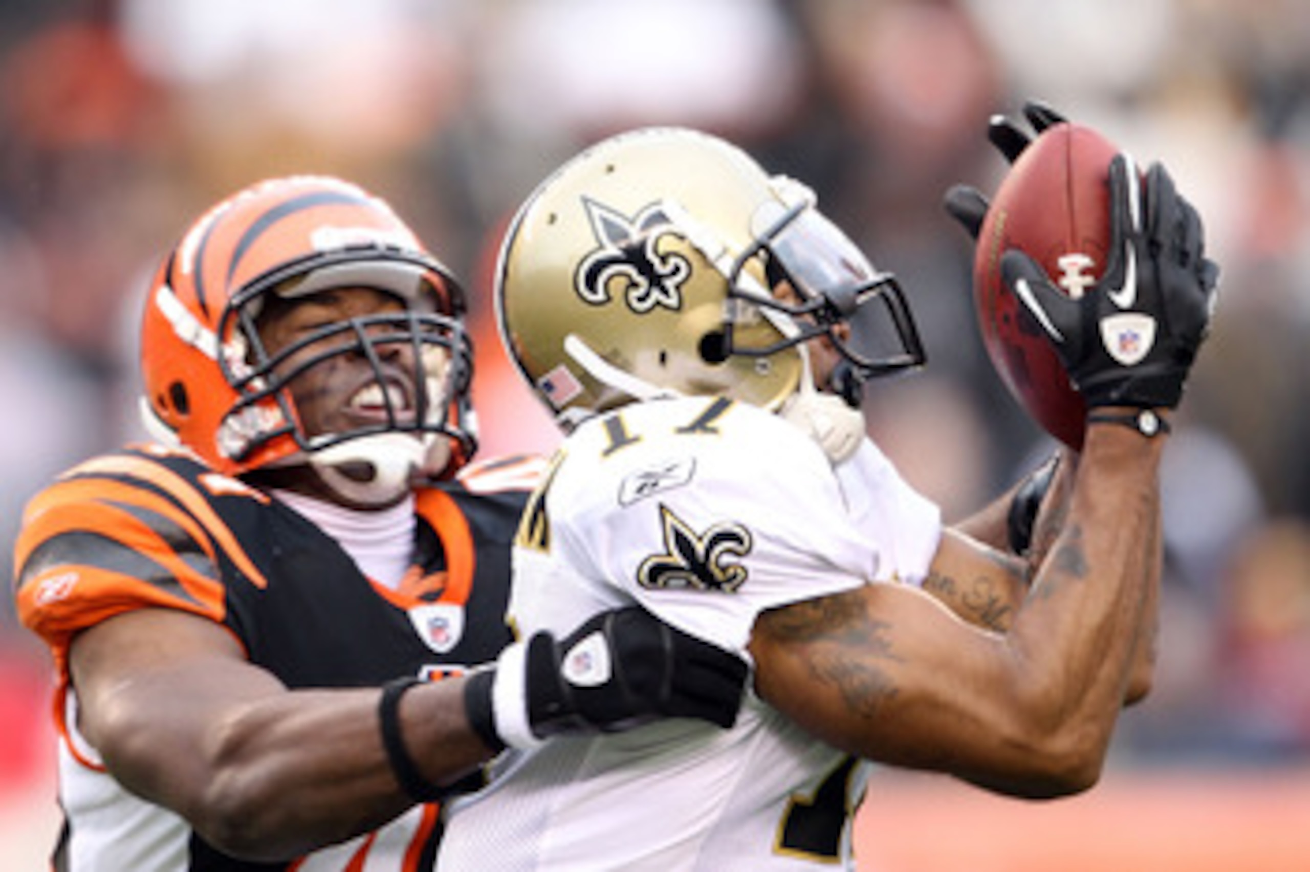CINCINNATI, OH - DECEMBER 05: Robert Meachem #17 of the New Orleans Saints catches pass while defended by Chinedum Ndukwe #41 of the Cincinnati Bengals during the NFL game at Paul Brown Stadium on December 5, 2010 in Cincinnati, Ohio.  The Saints won 34-3